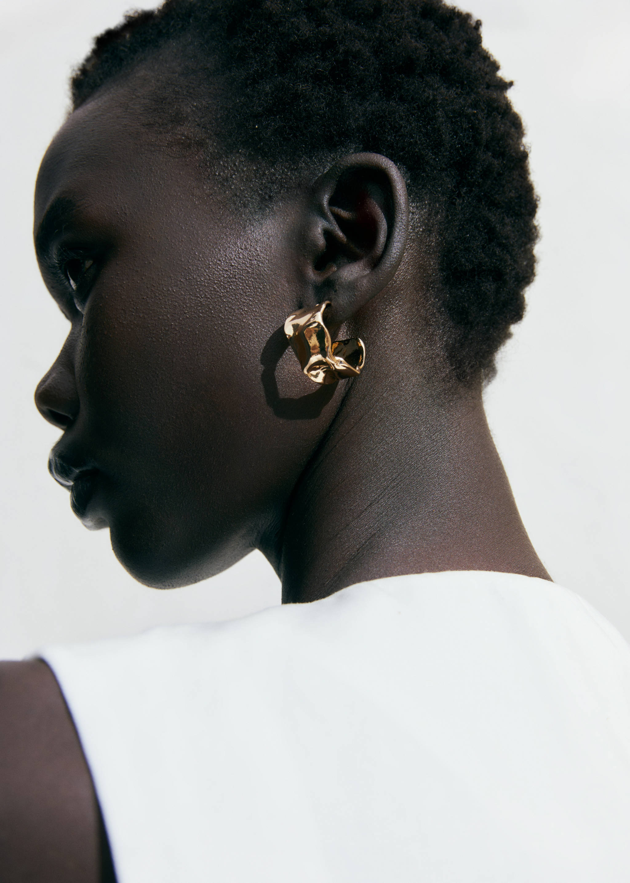 Twisted hoop earrings - General plane