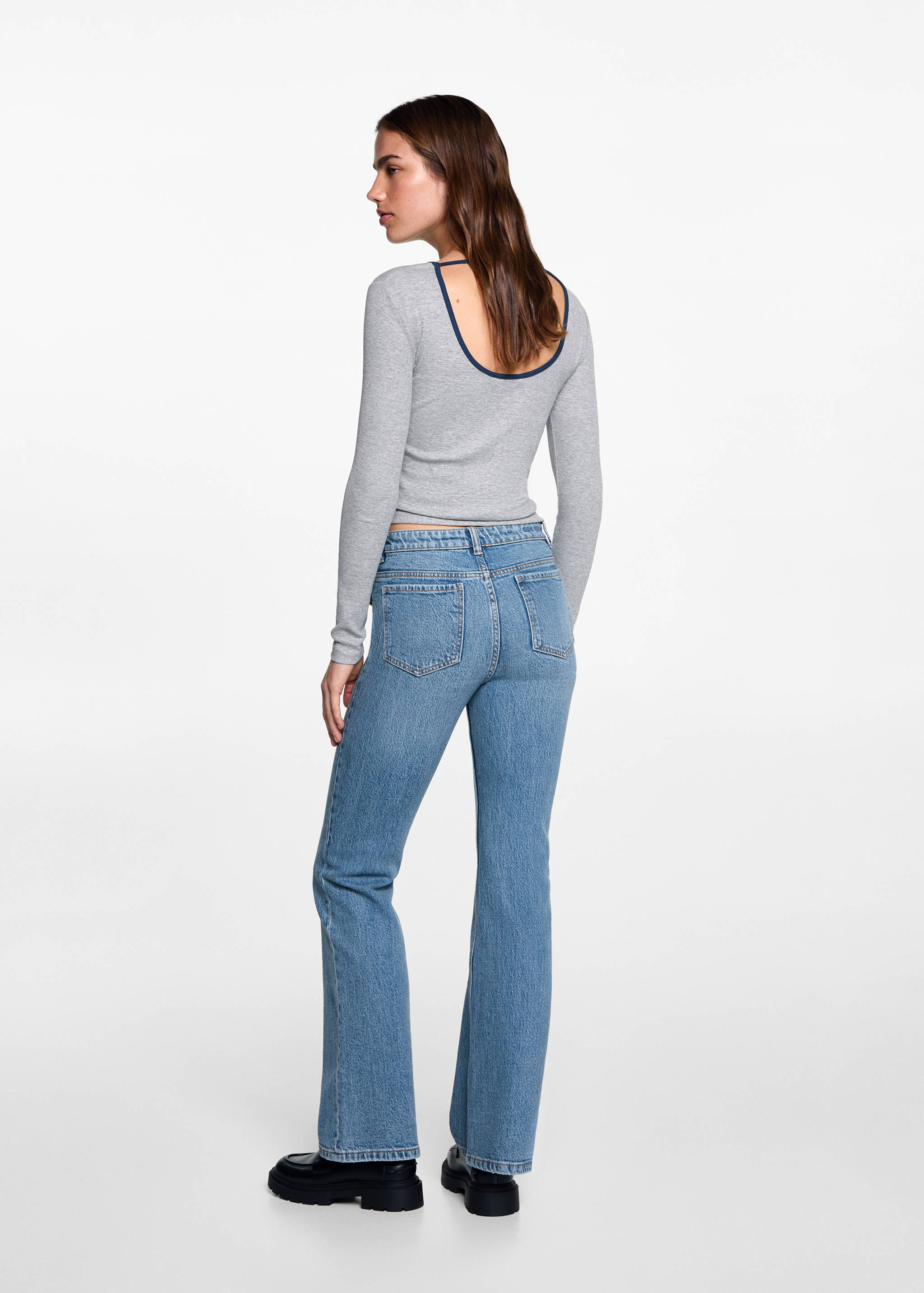 Flared jeans with pocket - Reverse of the article