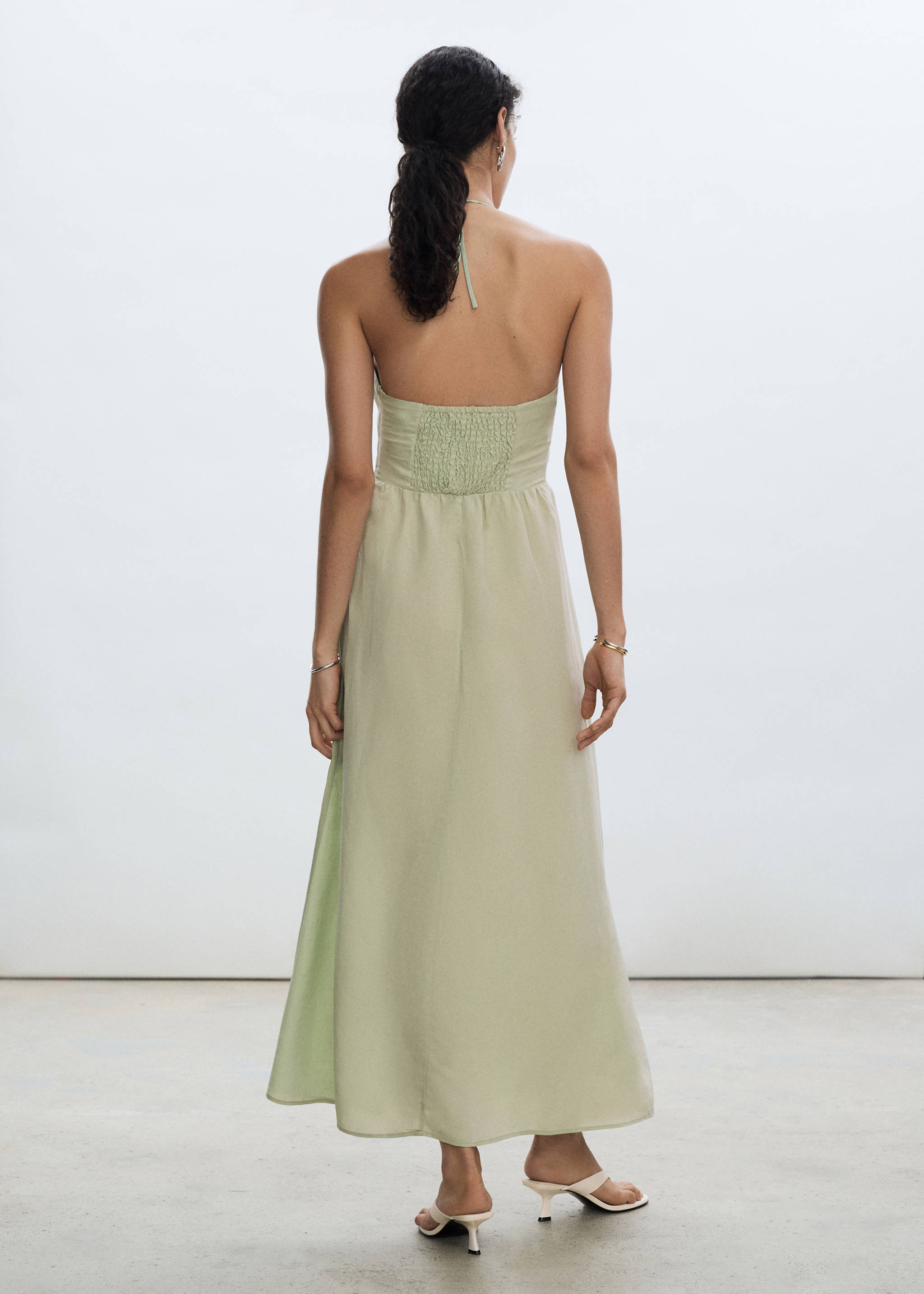 Long halter-neck dress - Reverse of the article