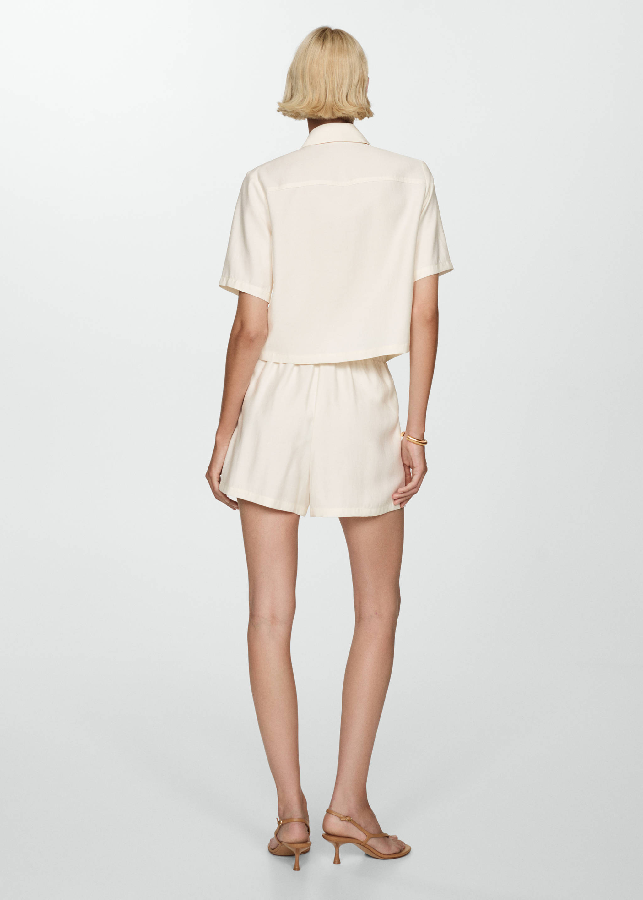 Short sleeve shirt with pockets - Reverse of the article