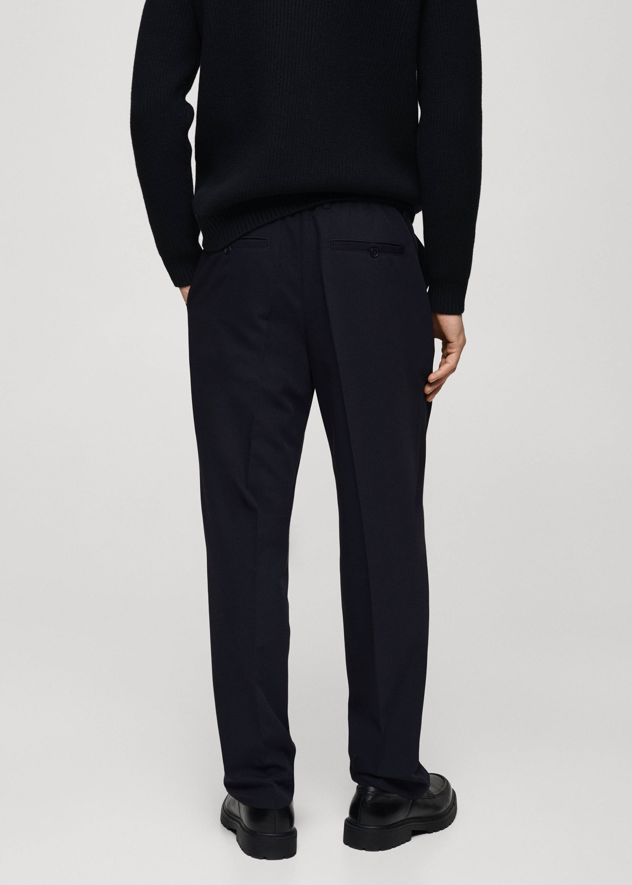 Regular-fit pleated flowy pants - Reverse of the article