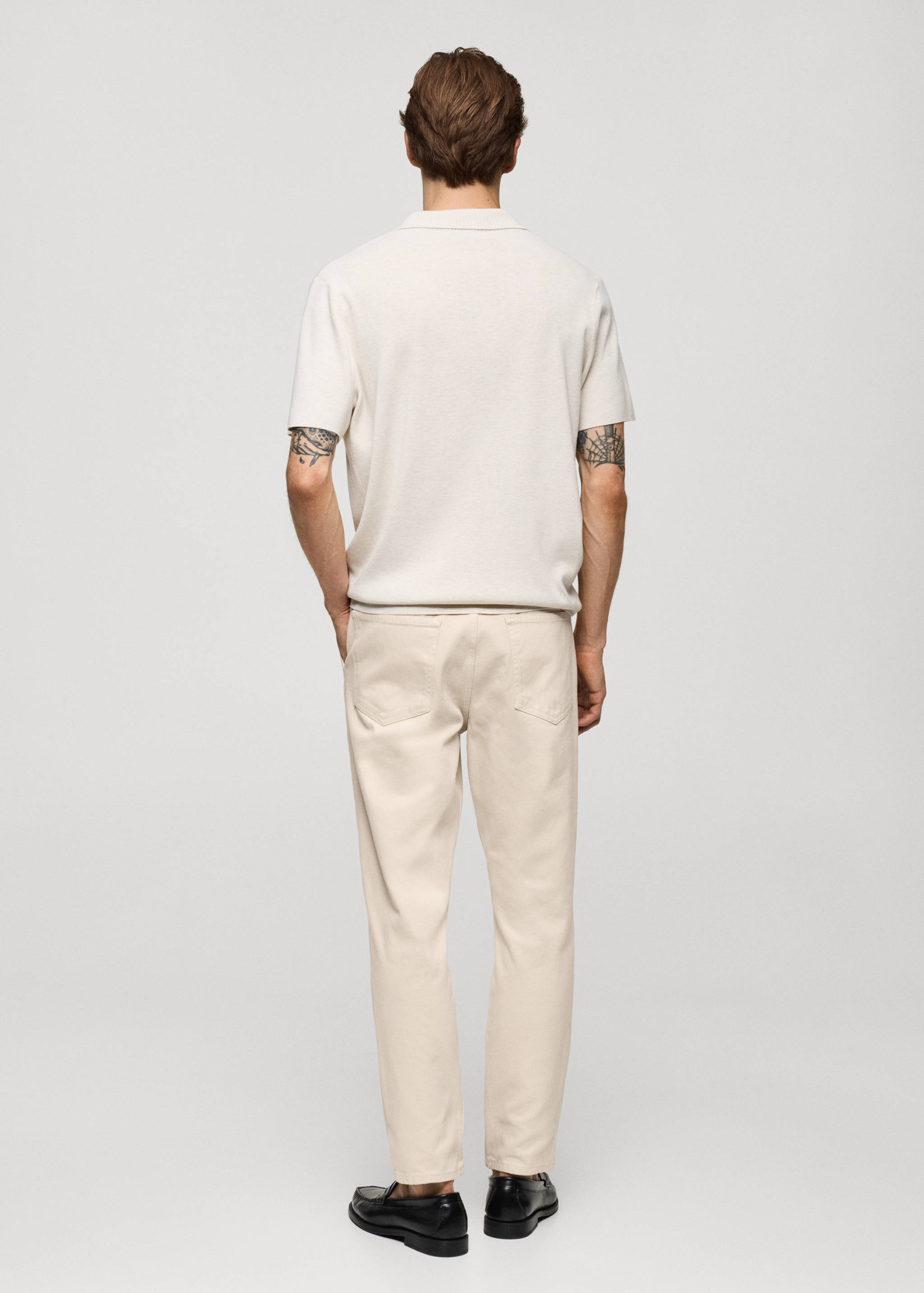 Pleated tapered fit jeans - Reverse of the article