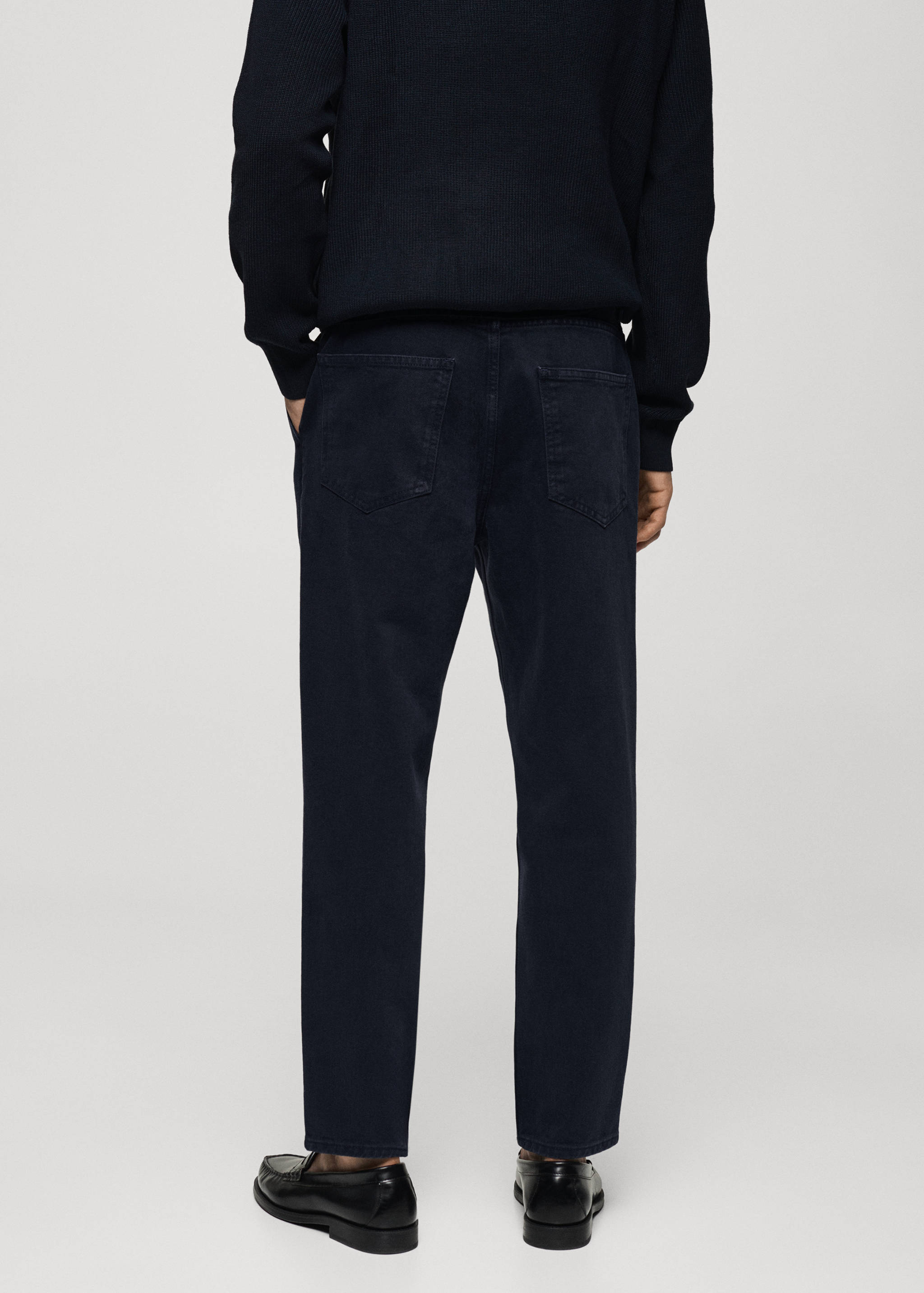 Pleated tapered fit jeans - Reverse of the article