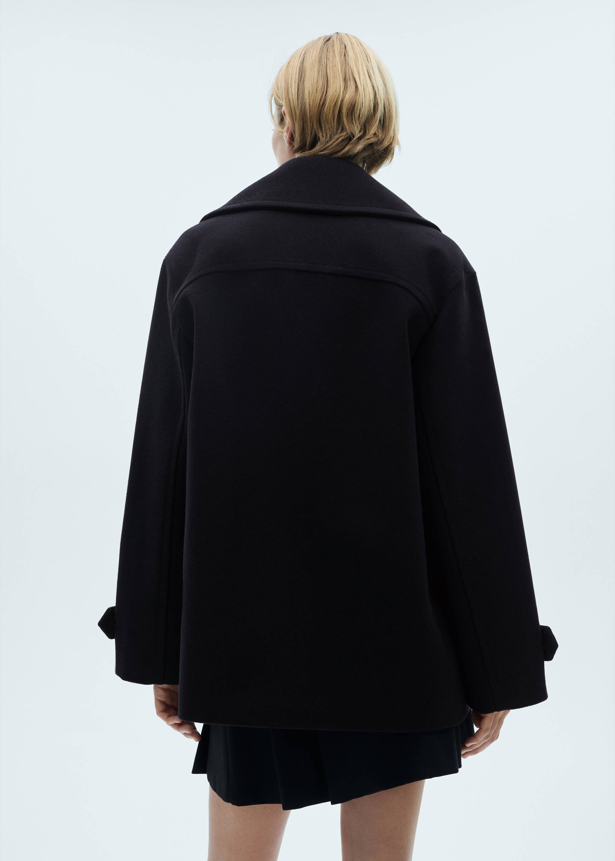 Double-breasted wool coat - Reverse of the article