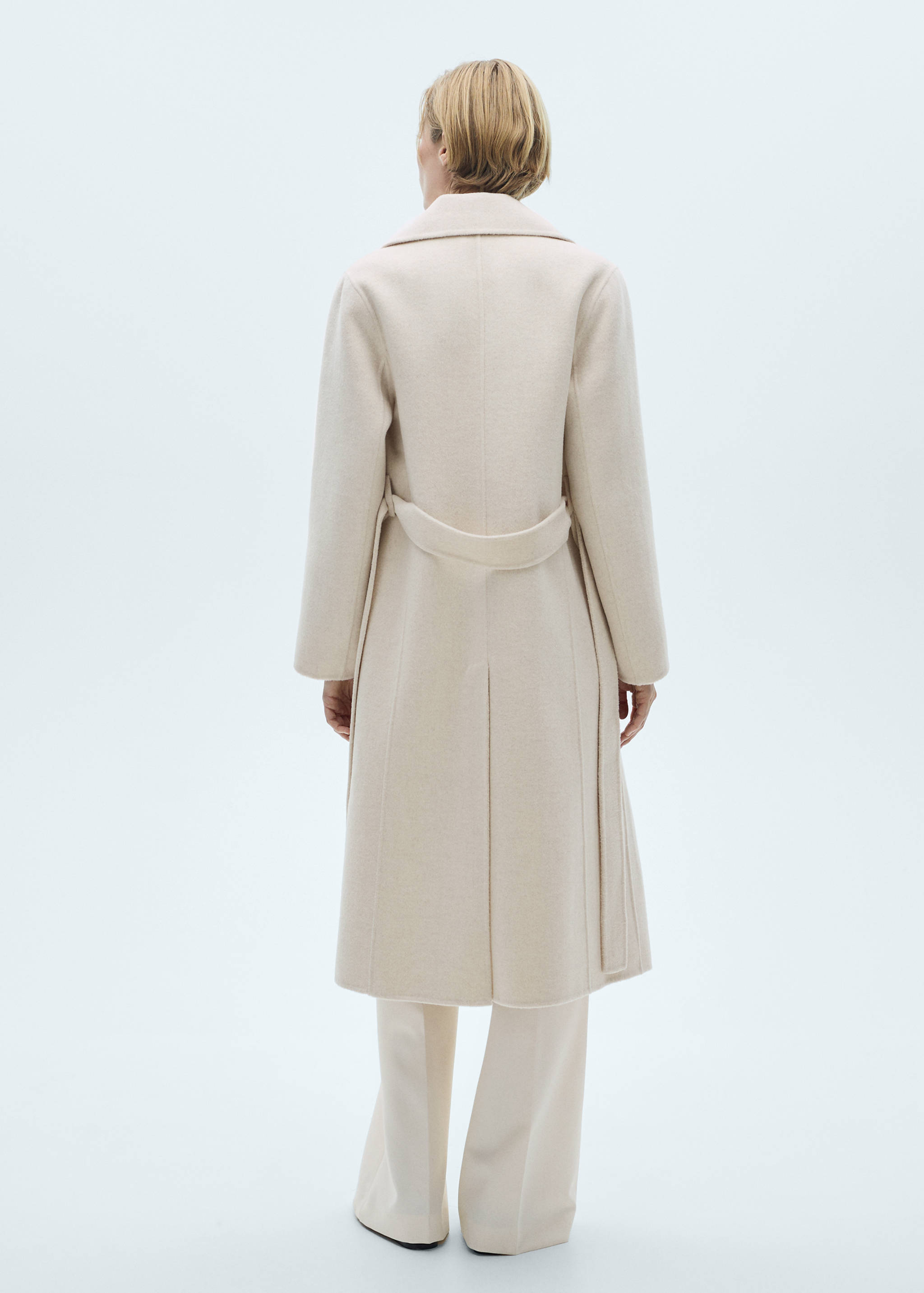 Handmade wool coat with belt - Reverse of the article