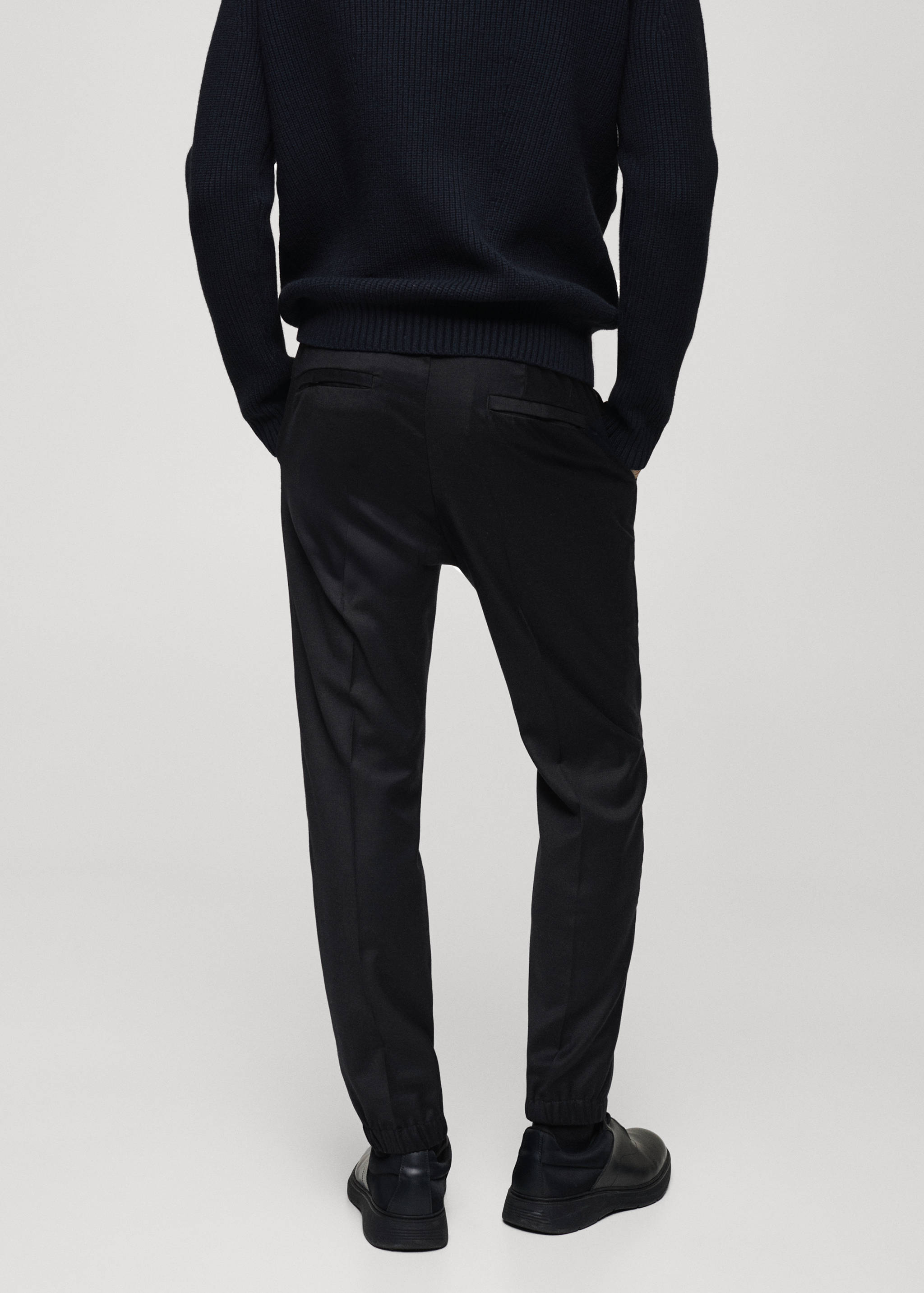 Брюки из смесовой шерсти со шнурком - Обратная сторона изделия