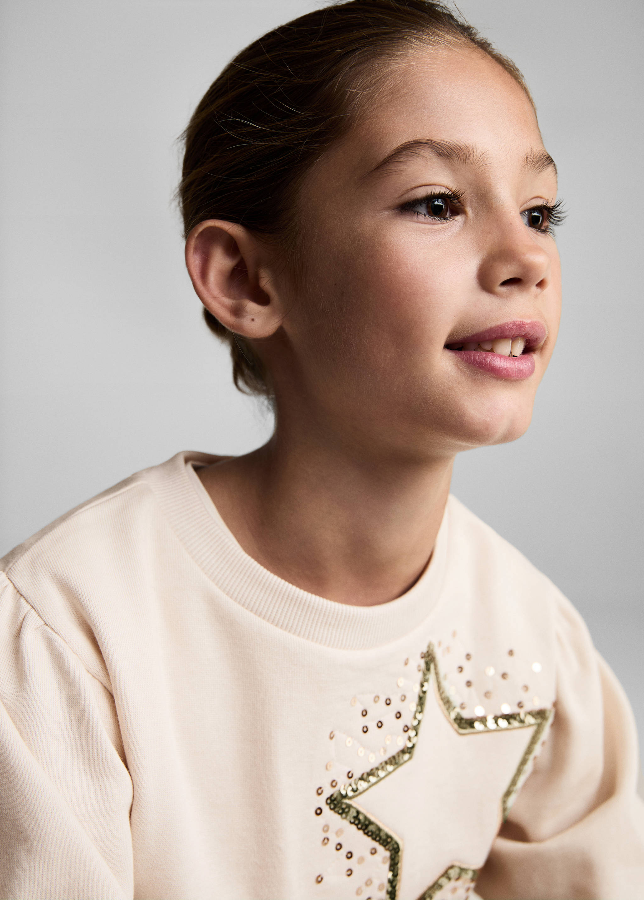 Sweatshirt com estrelas de lantejoulas - Pormenor do artigo 1