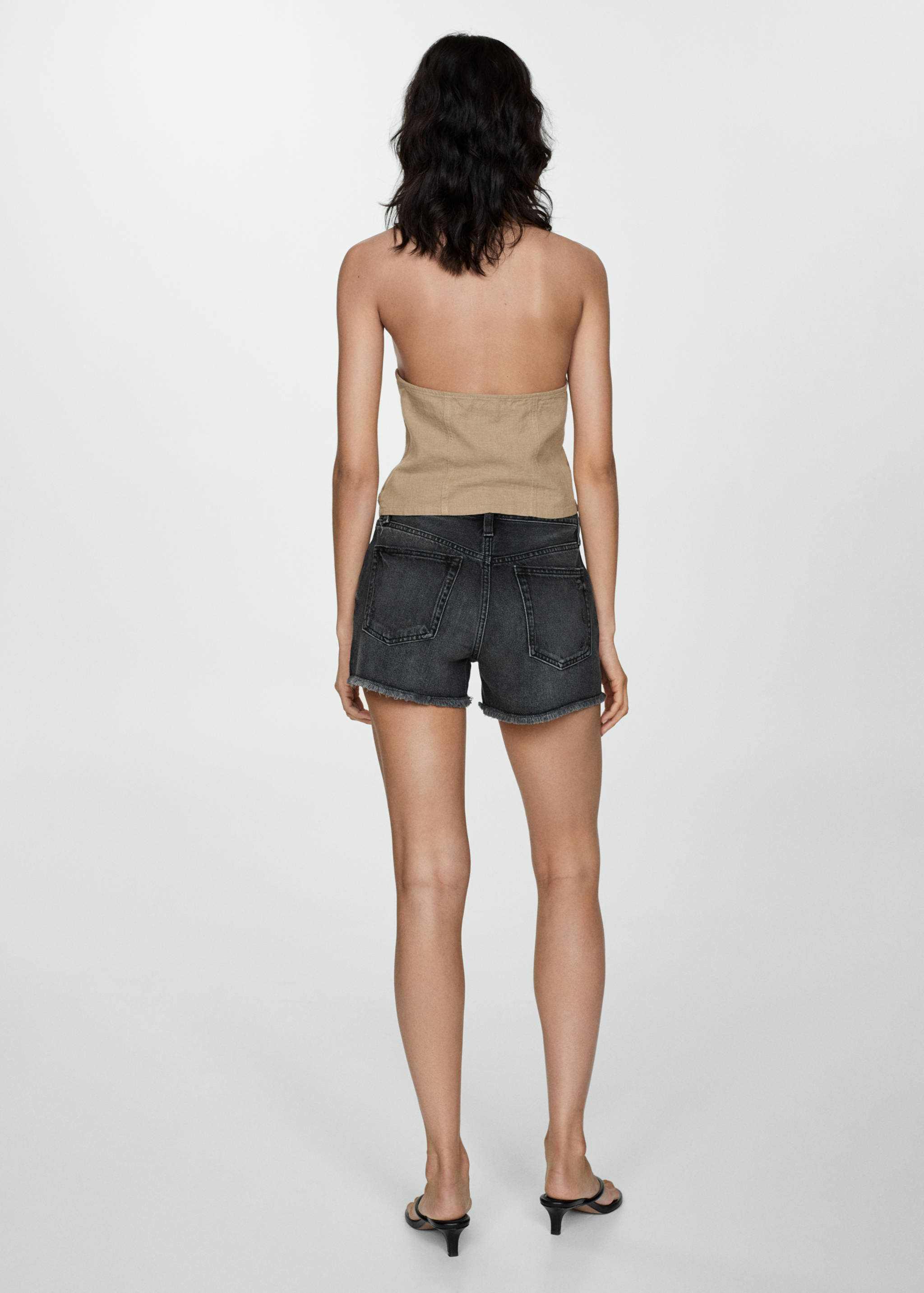 Broken denim shorts - Reverse of the article