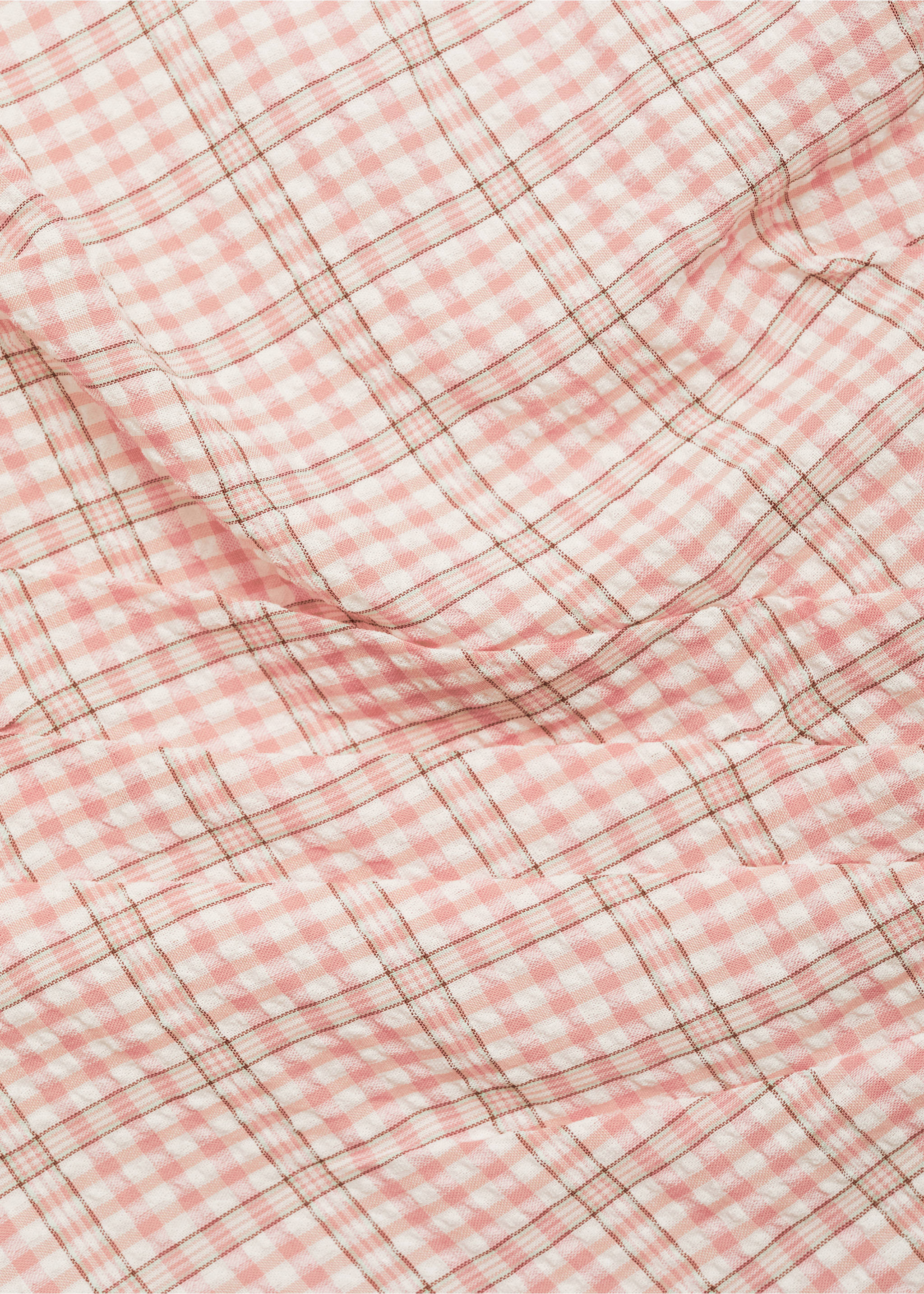 Close-up of the pink and white gingham fabric texture on a dress., Pastel Pink. Ref: 77022930-00.
