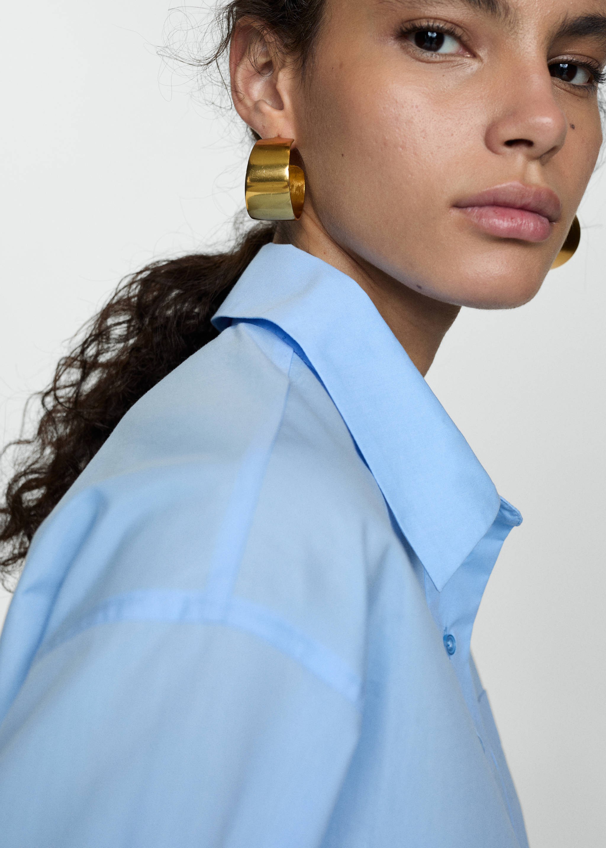 Cropped polo-neck shirt - Details of the article 1