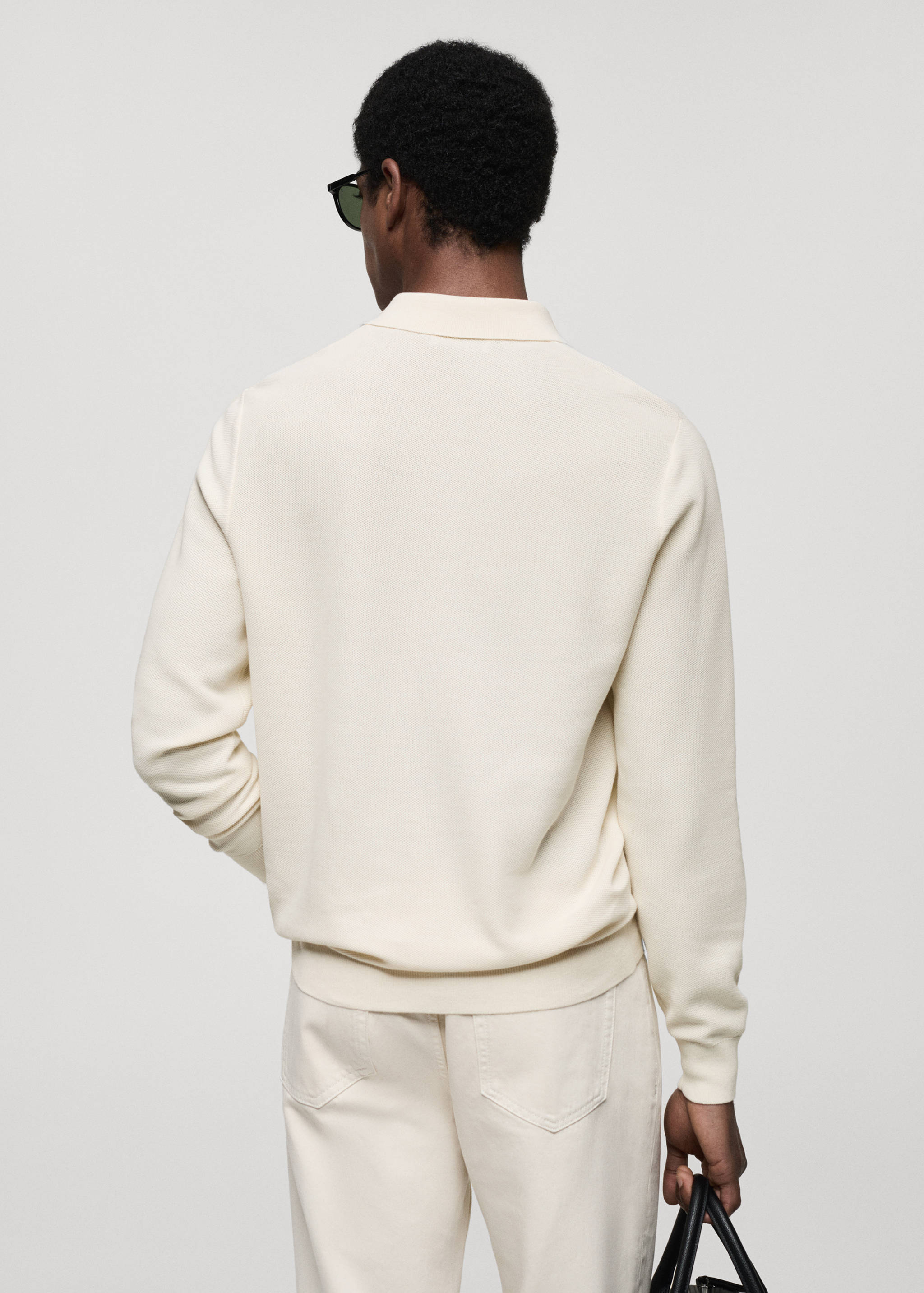 Knitted structured polo sweater - Reverse of the article