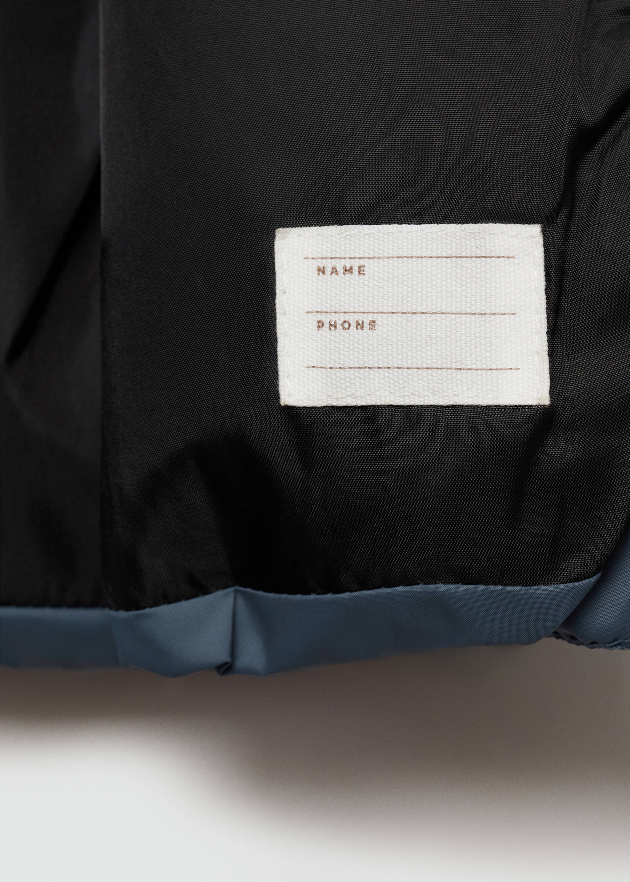 Quilted gilet with pockets - Details of the article 0