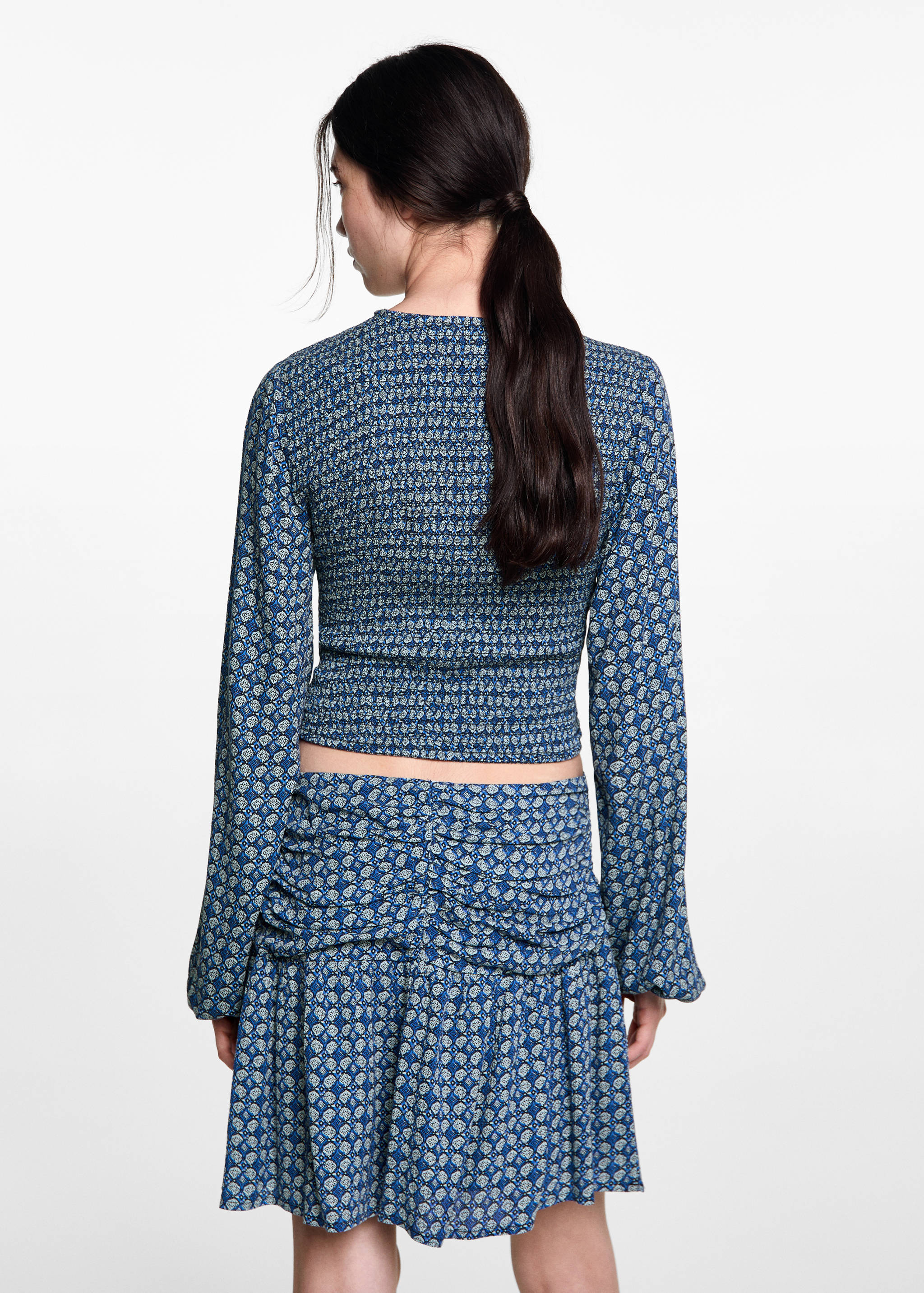 Printed pleated skirt - Reverse of the article