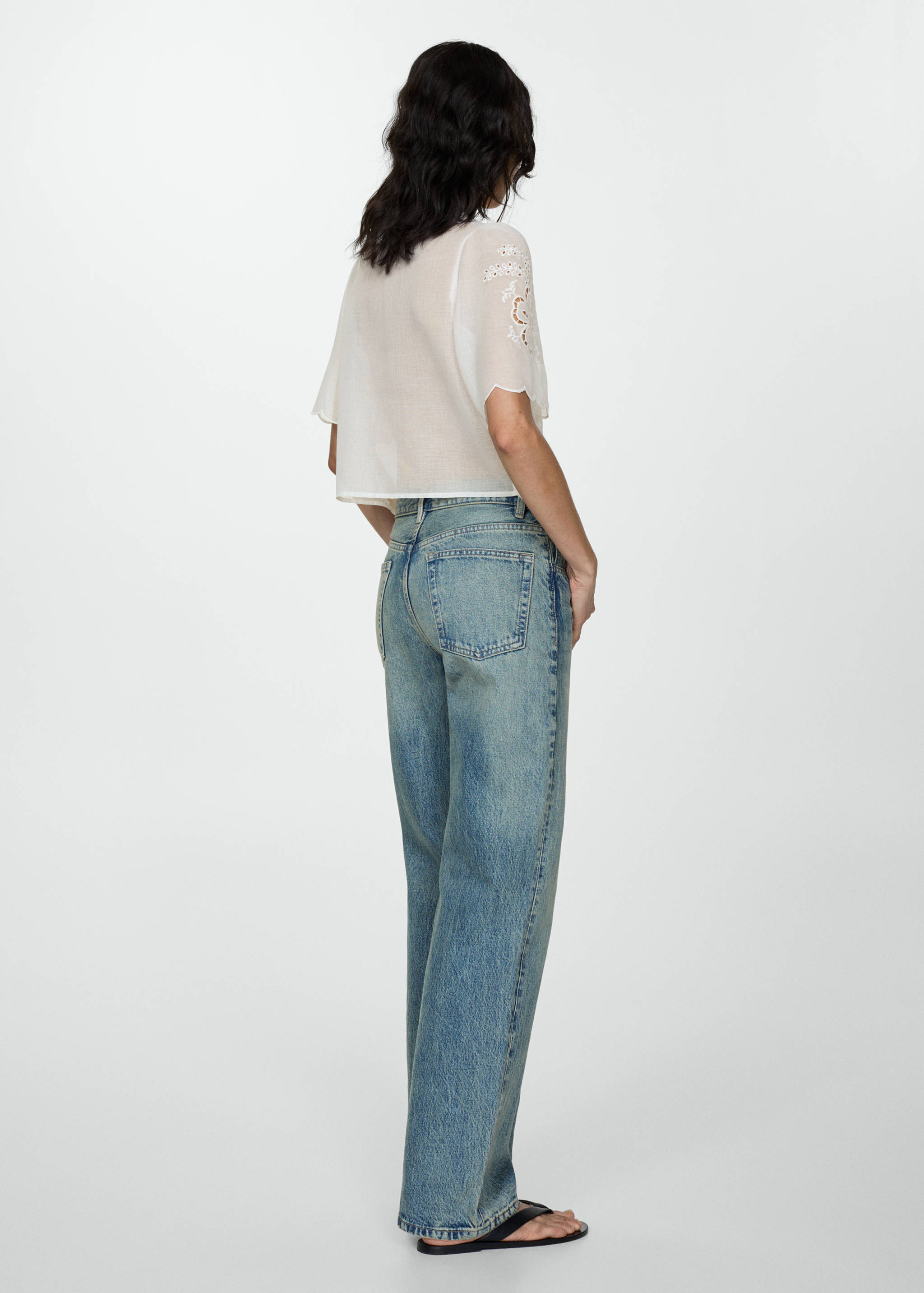 Embroidered blouse with bows - Reverse of the article