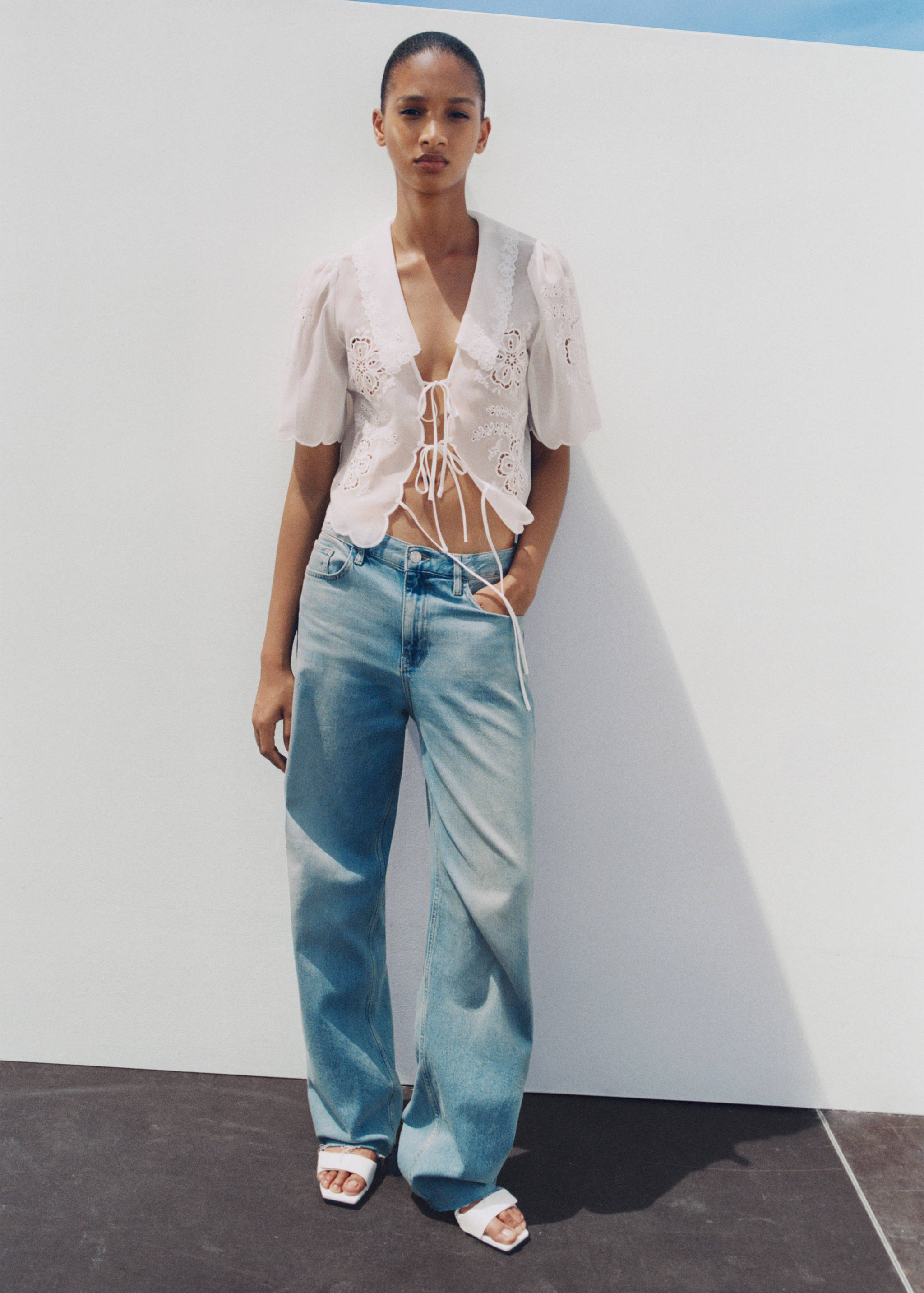 Embroidered blouse with bows - Details of the article 7