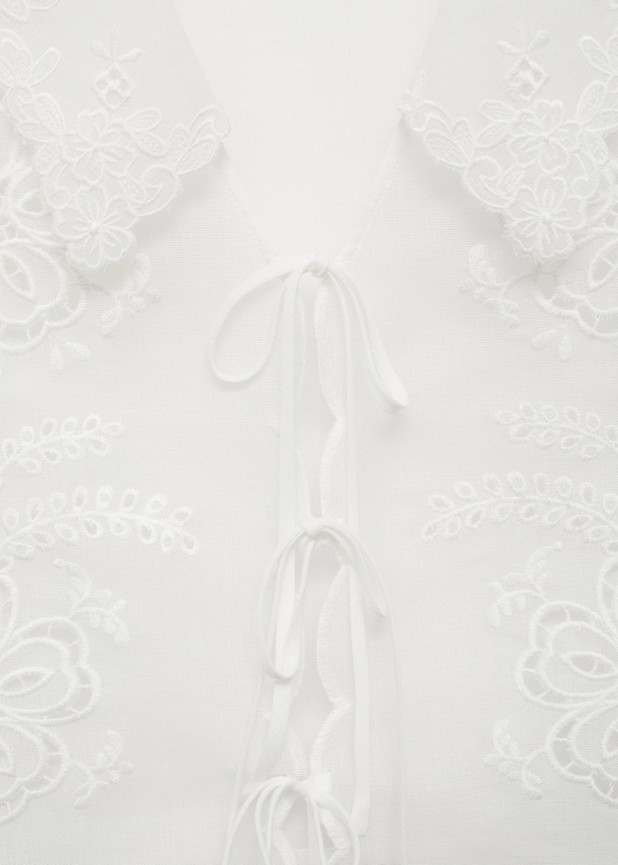 Embroidered blouse with bows - Details of the article 8