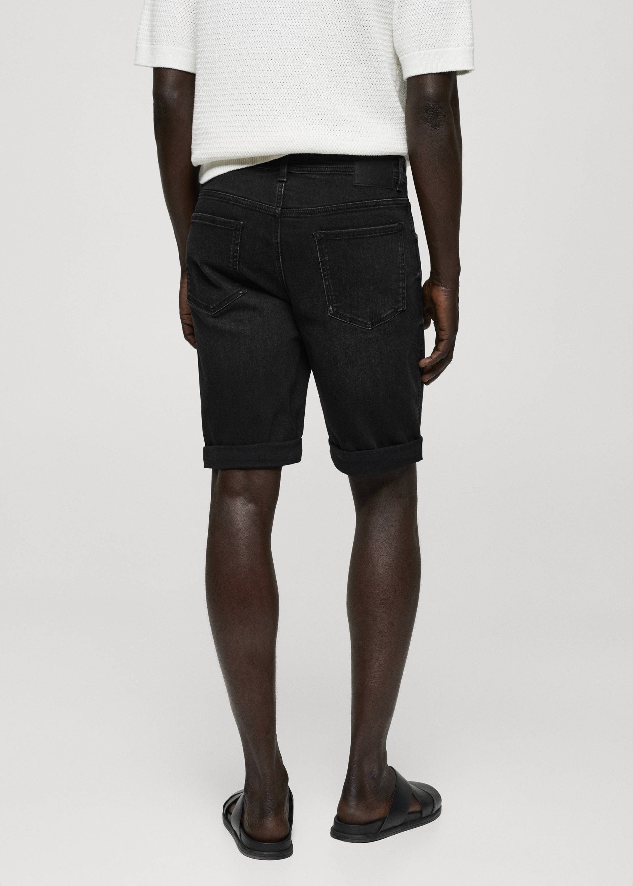 Slim-fit denim bermuda shorts - Reverse of the article