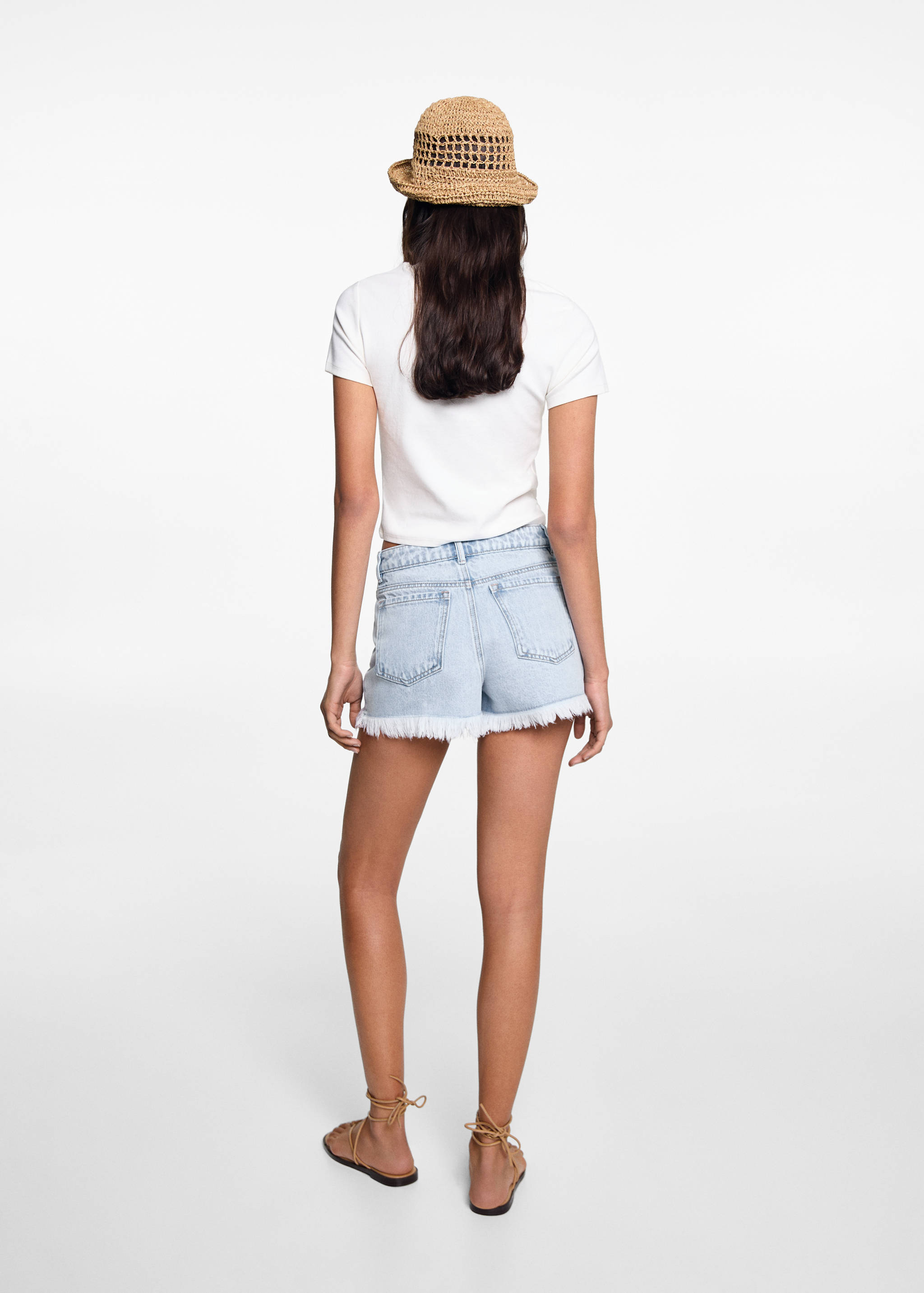 Denim shorts with frayed hem - Reverse of the article
