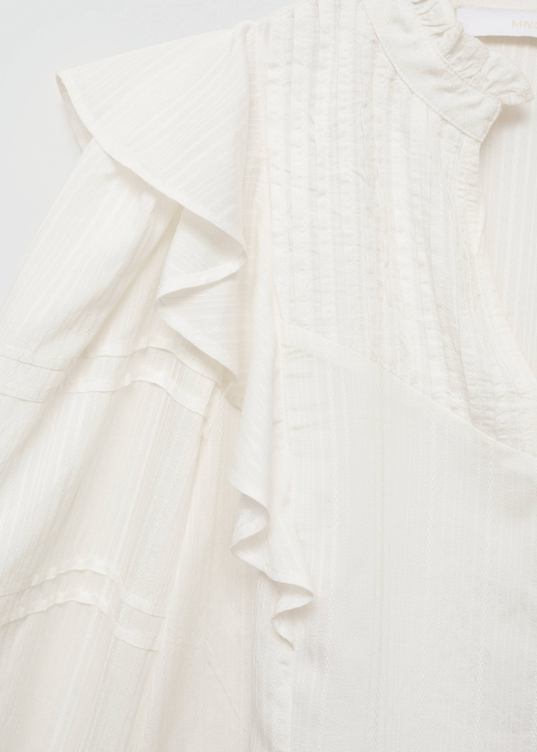 Blouse with pleat relief - Details of the article 0