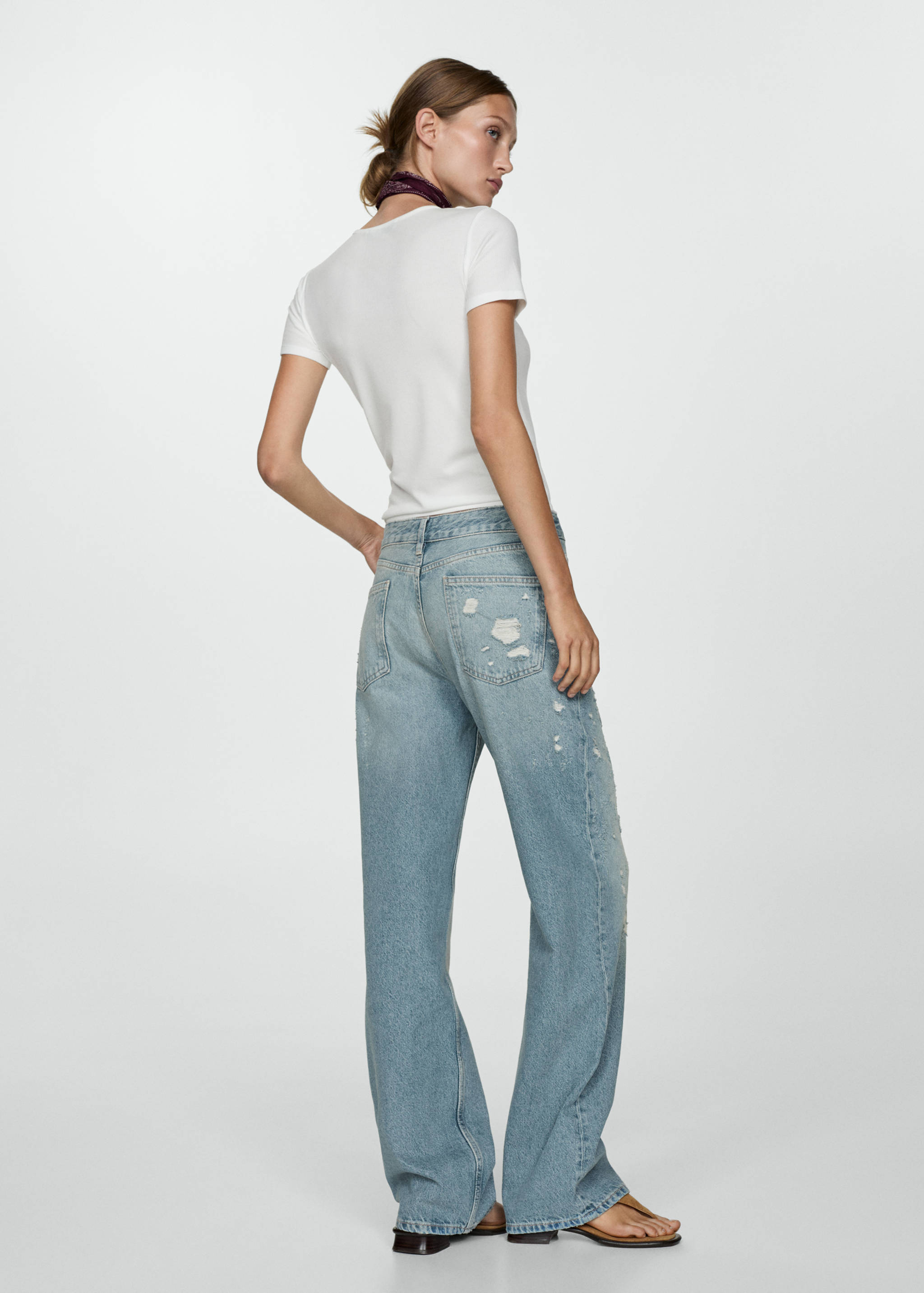 Ripped straight jeans - Reverse of the article