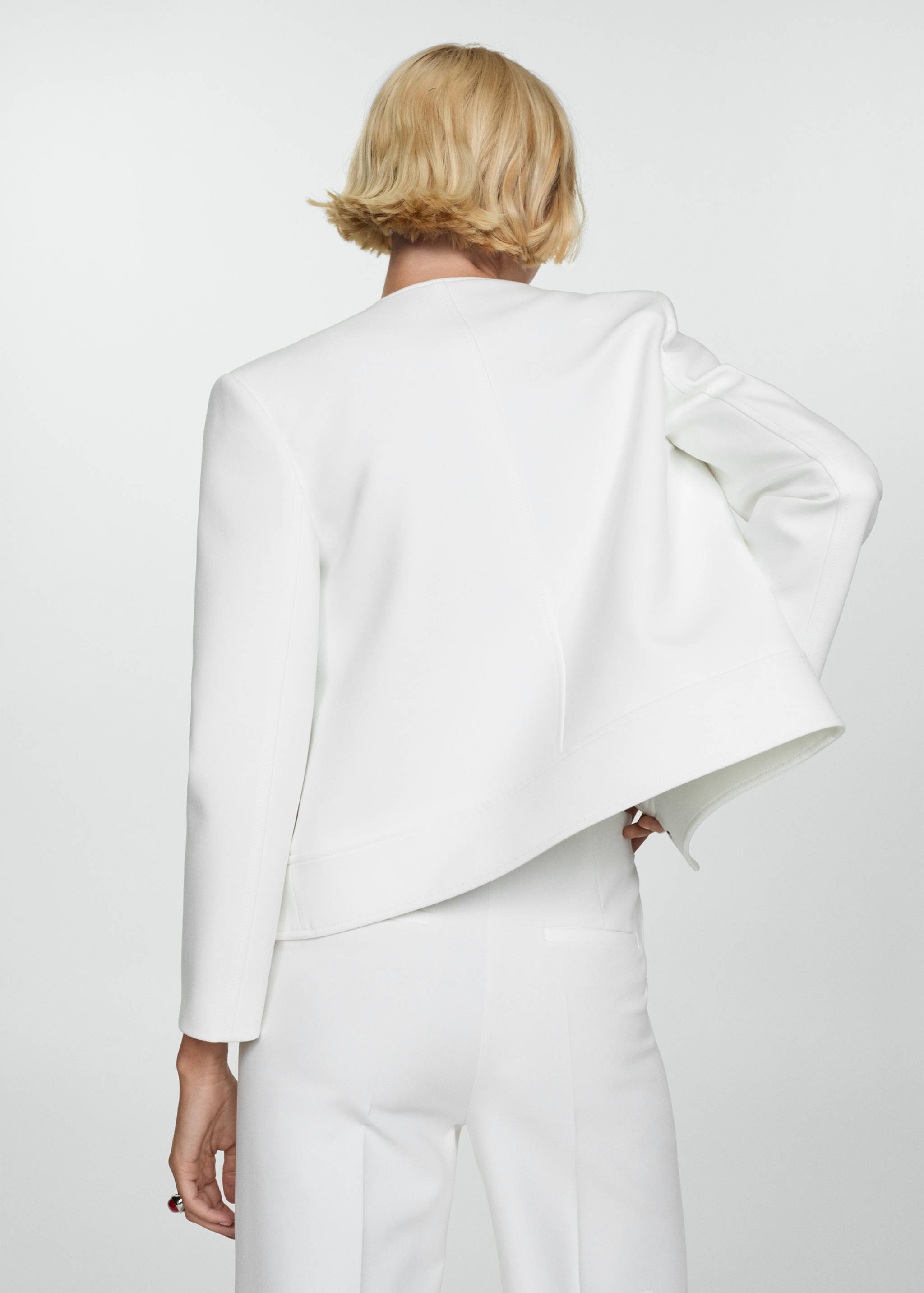 Buttoned jacket with pockets - Reverse of the article