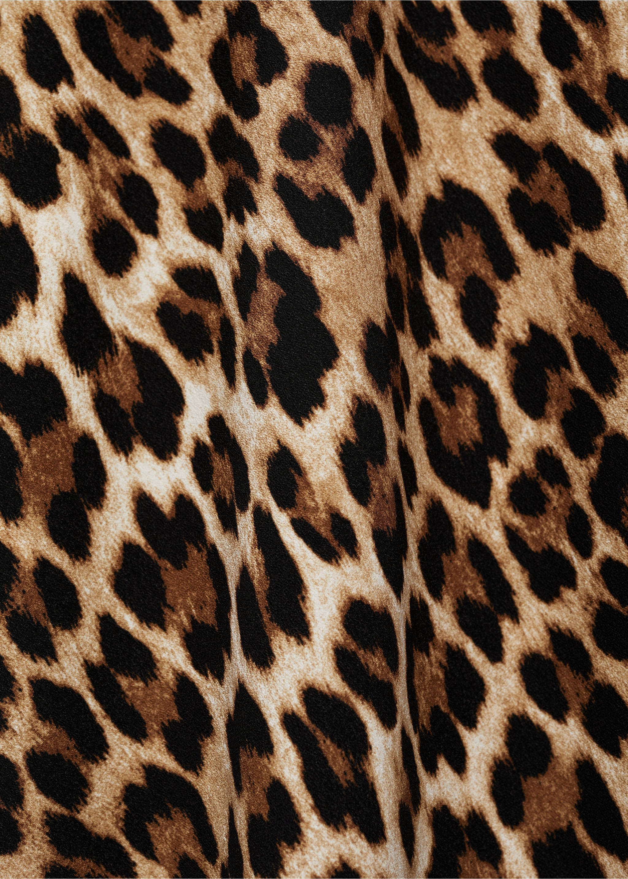 Close-up of leopard print fabric on a dress., Brown. Ref: 77035673-00.