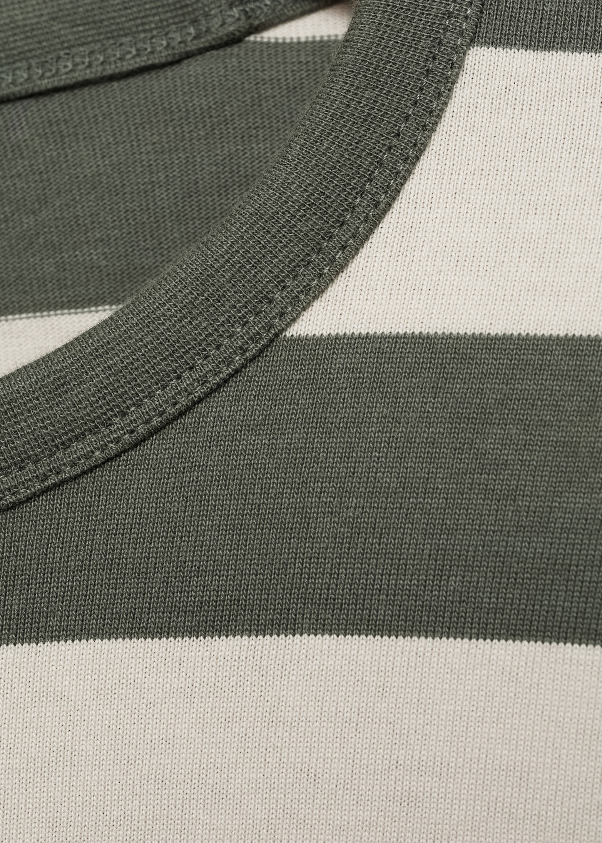 Close-up of a dark green and off-white striped t-shirt with a ribbed crew neck., Forest Green. Ref: 77035975-00.