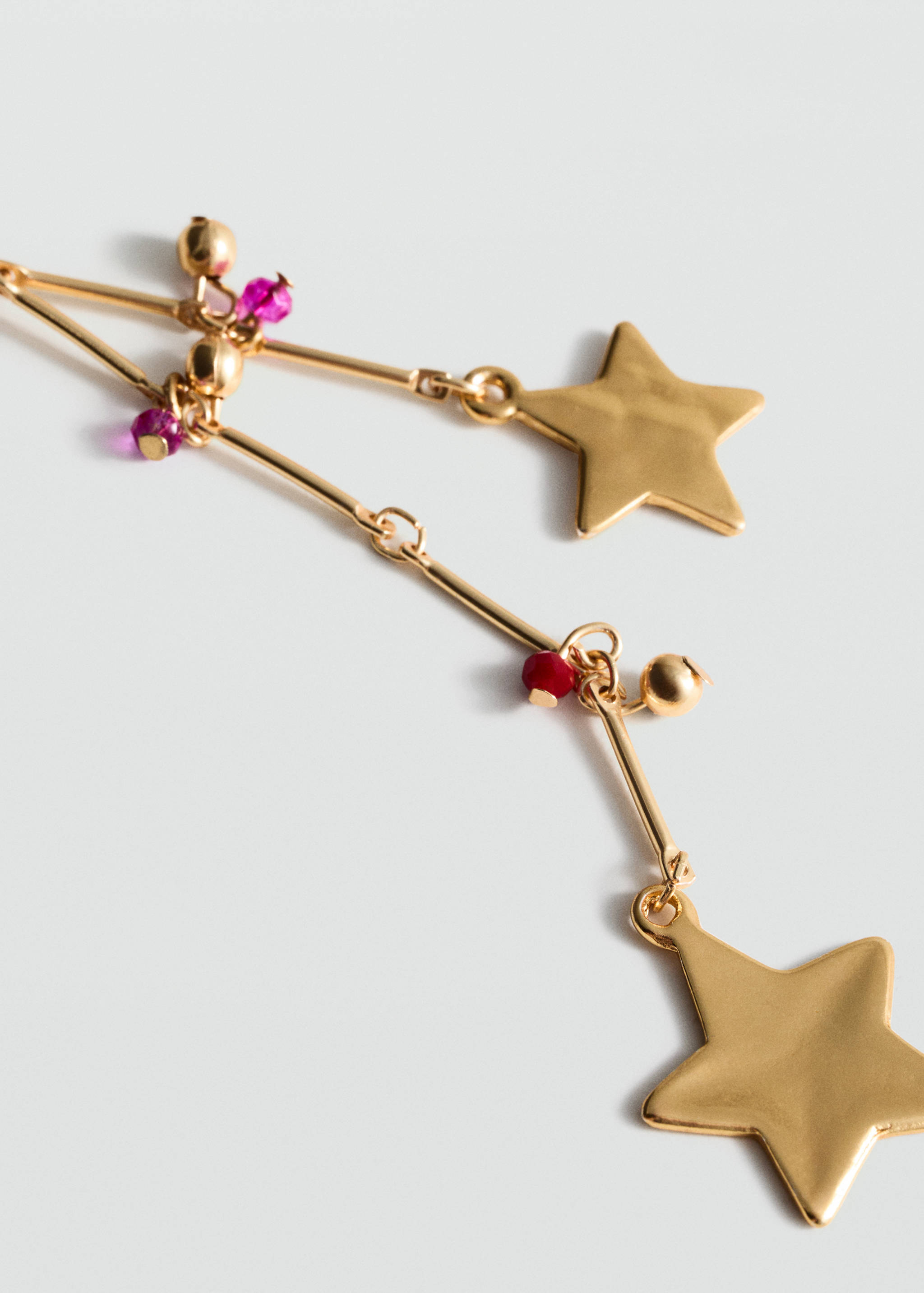 Collar estrellas colgantes - Plano medio