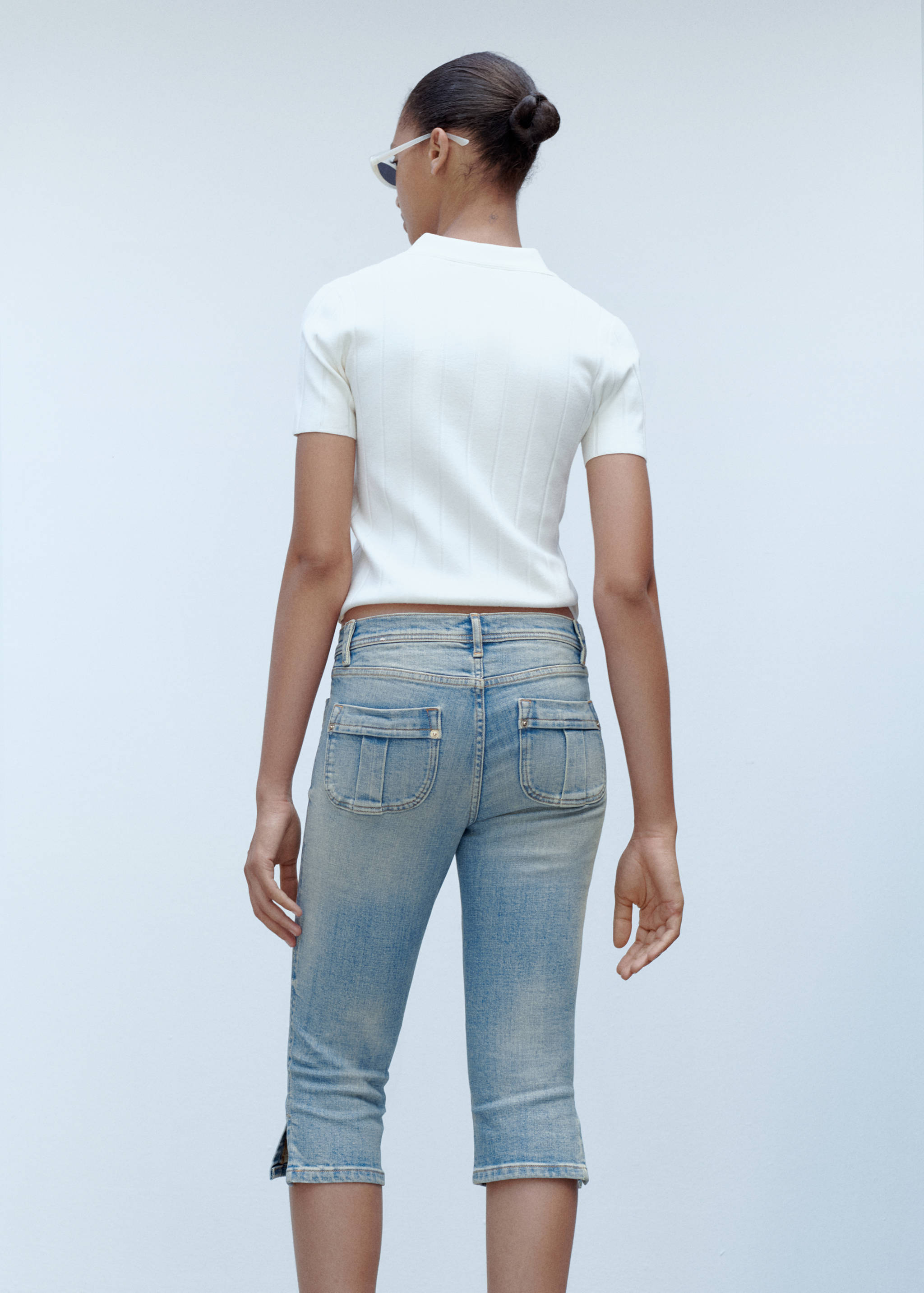 Capri jeans with pockets - Reverse of the article