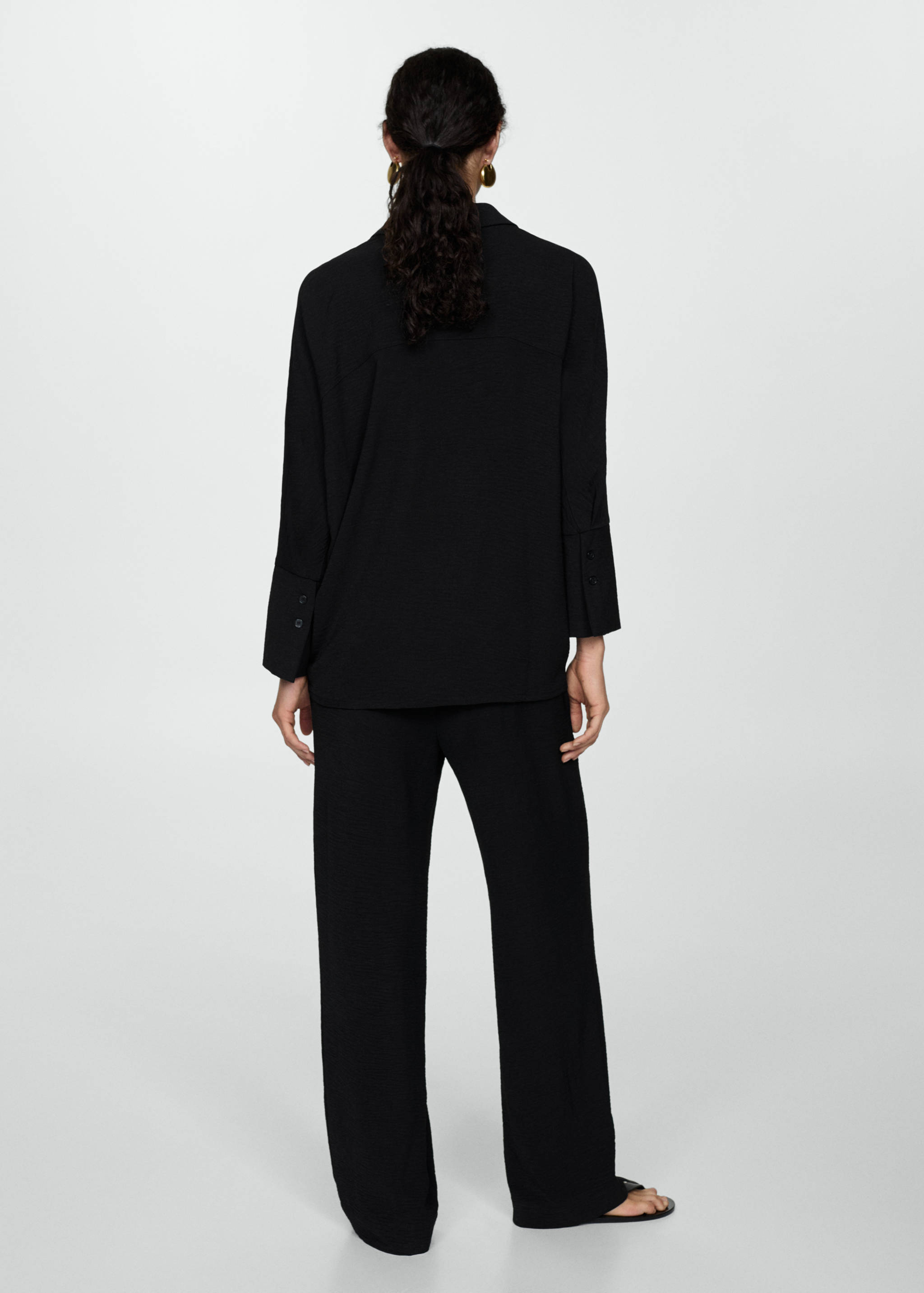 Textured flowy trousers - Reverse of the article