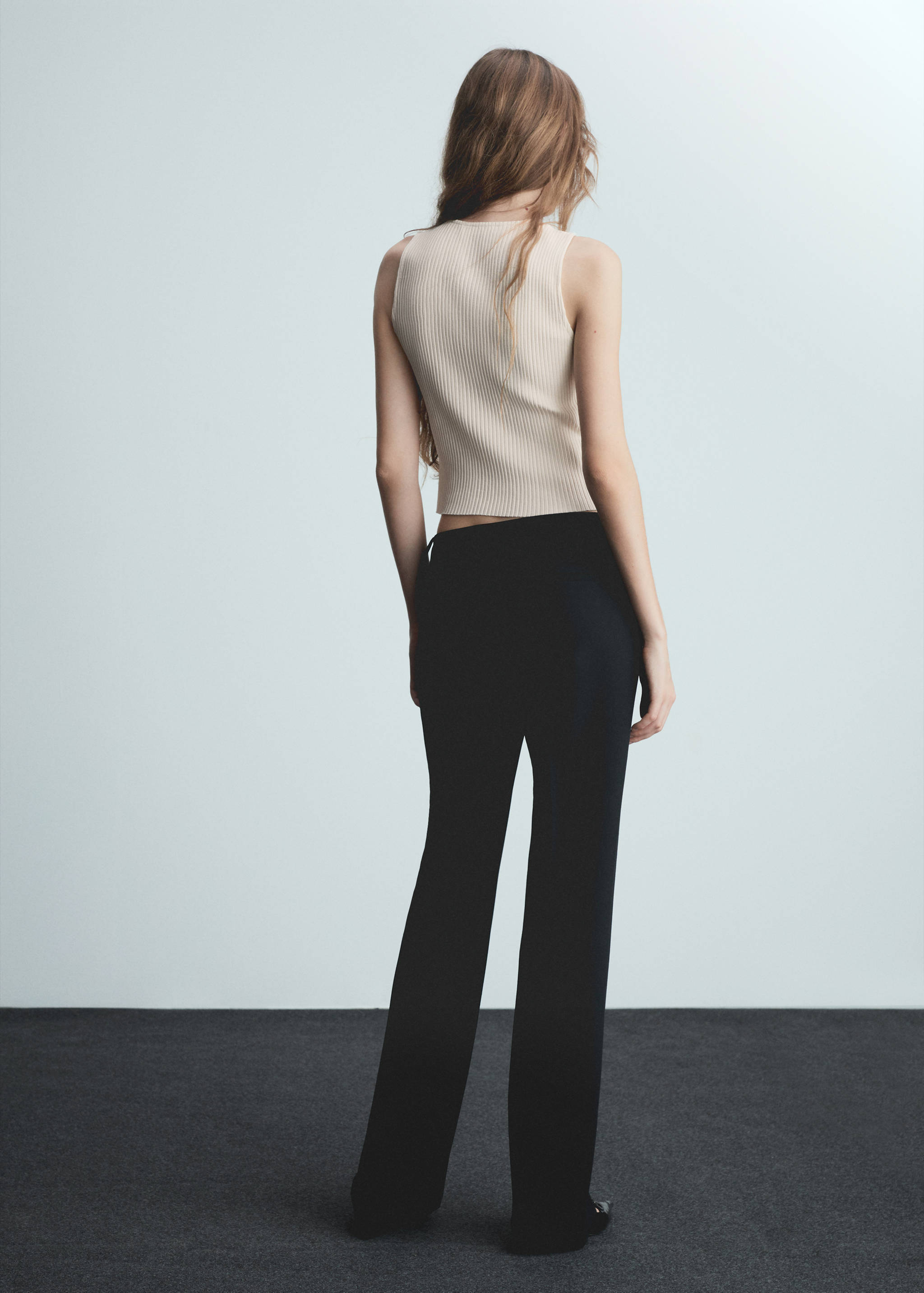 Knitted top with side buttons - Reverse of the article