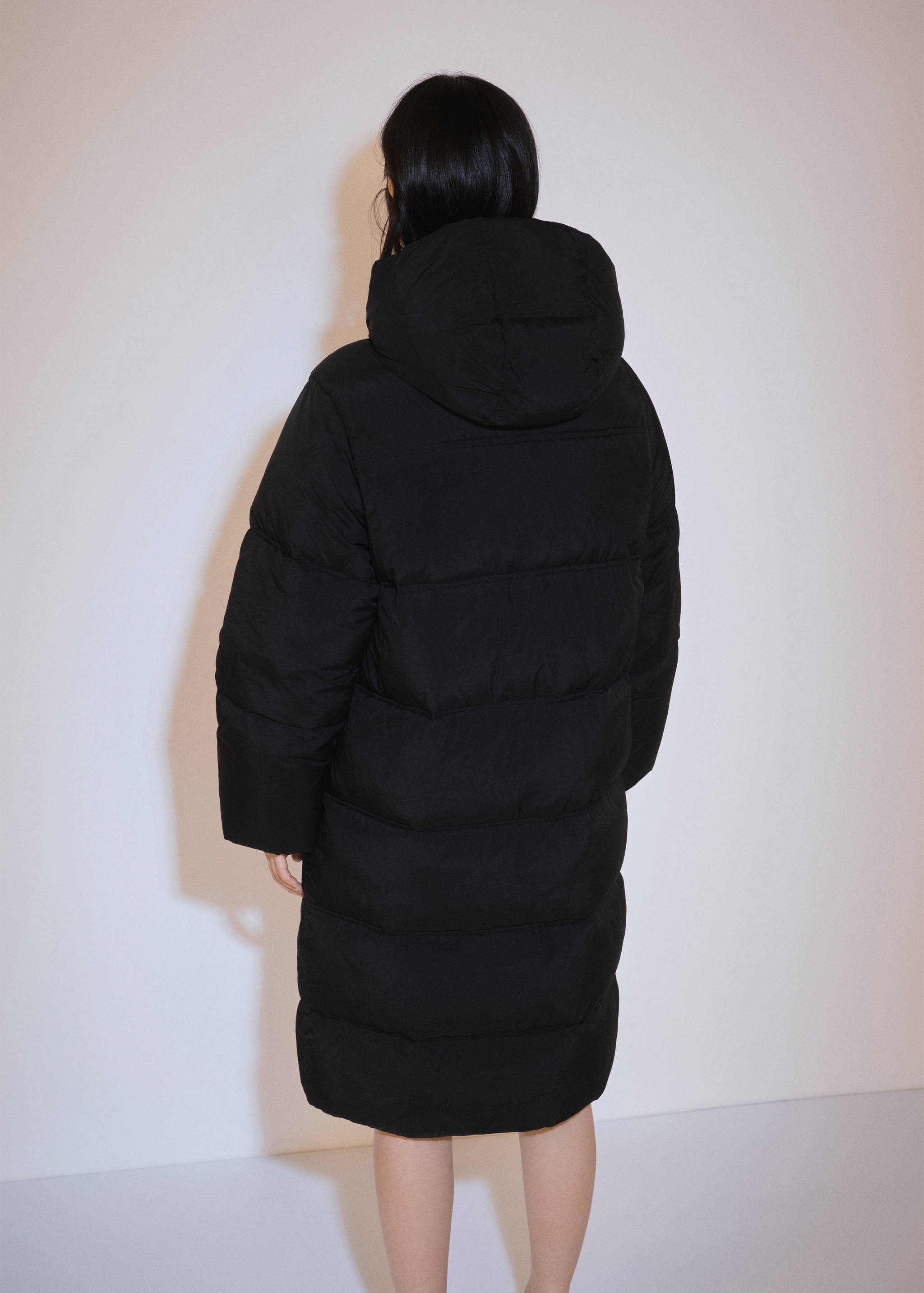 Quilted long coat - Reverse of the article