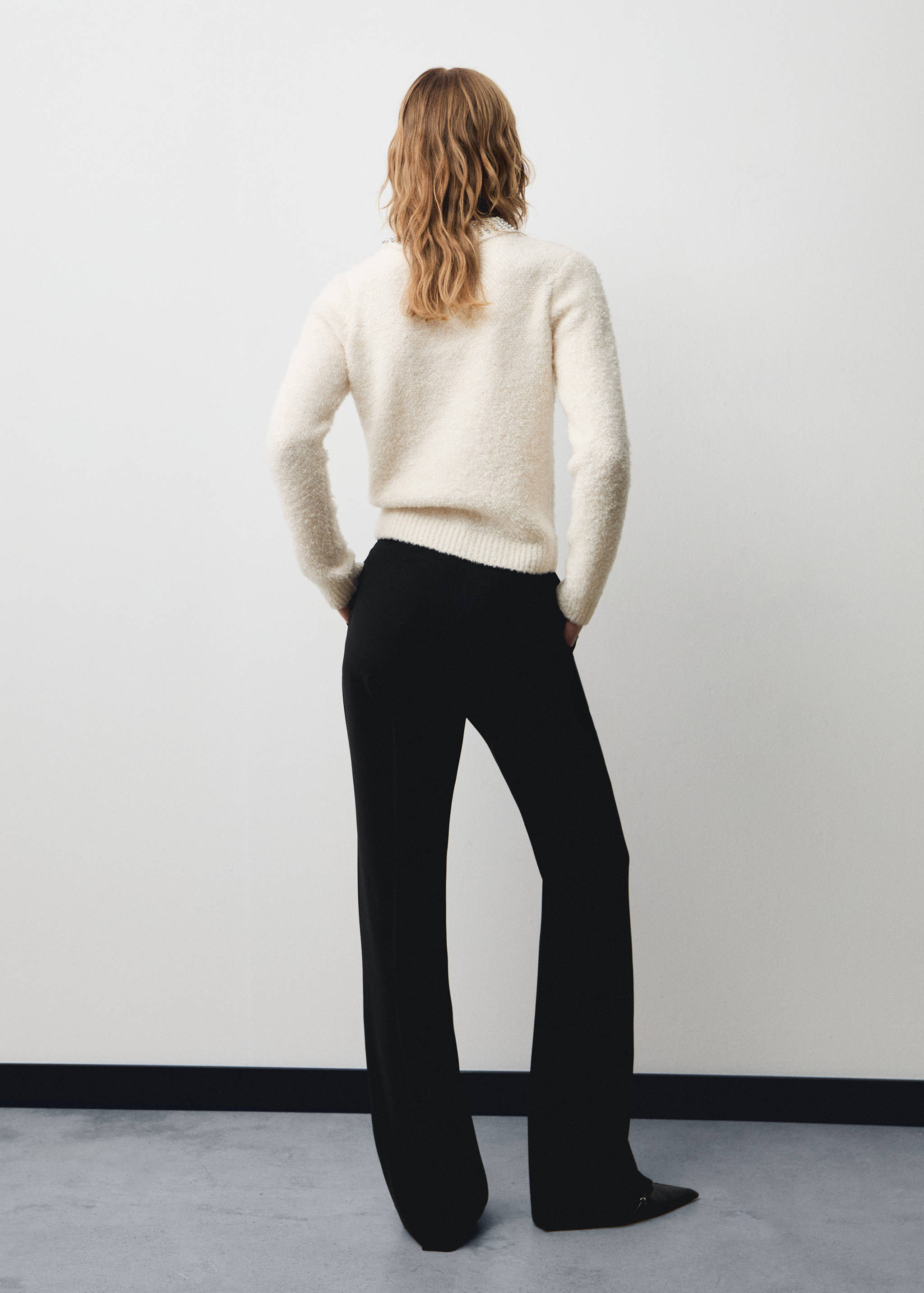 Polo-neck sweater with rhinestones - Reverse of the article