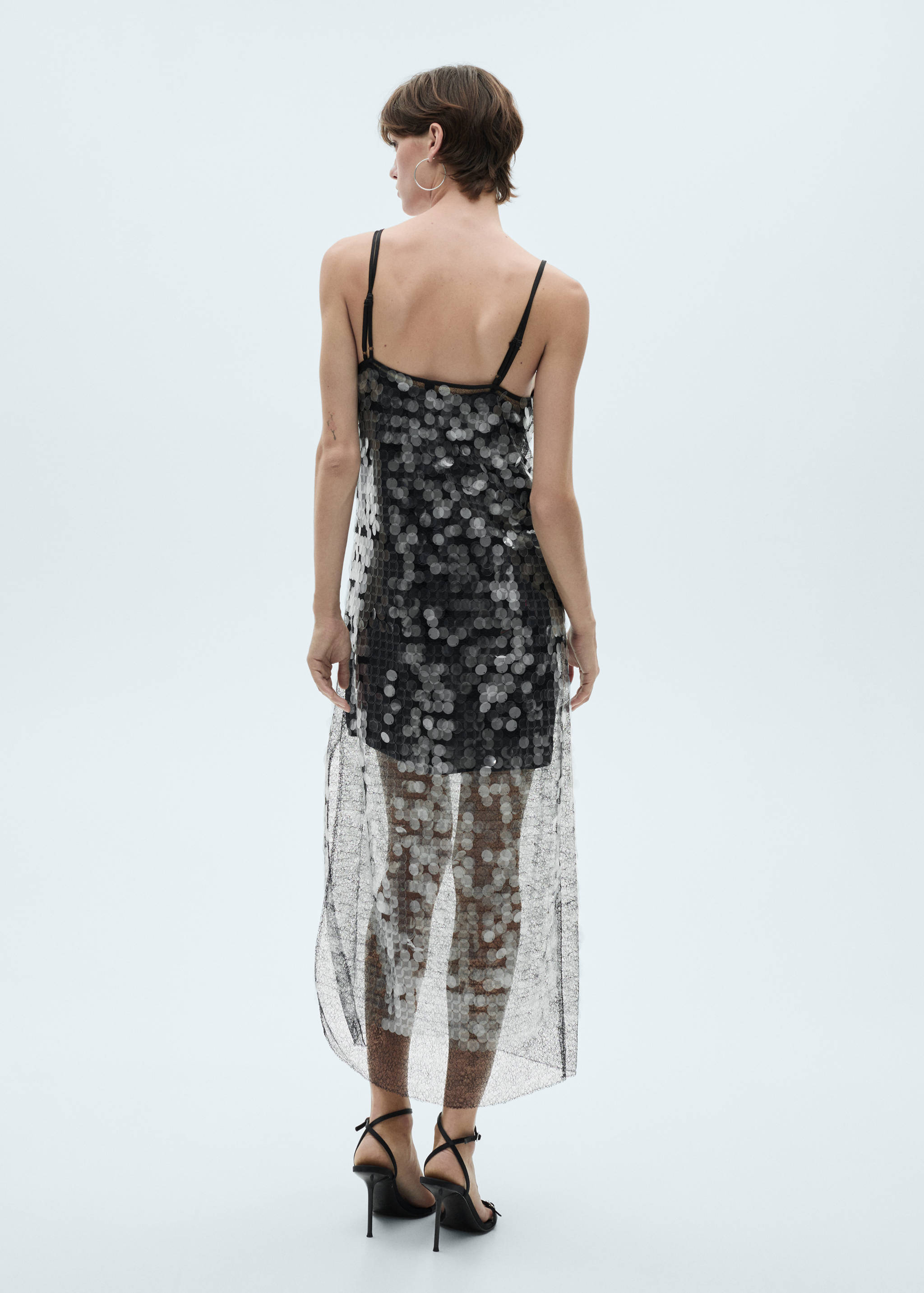 Semi-transparent disc dress - Reverse of the article