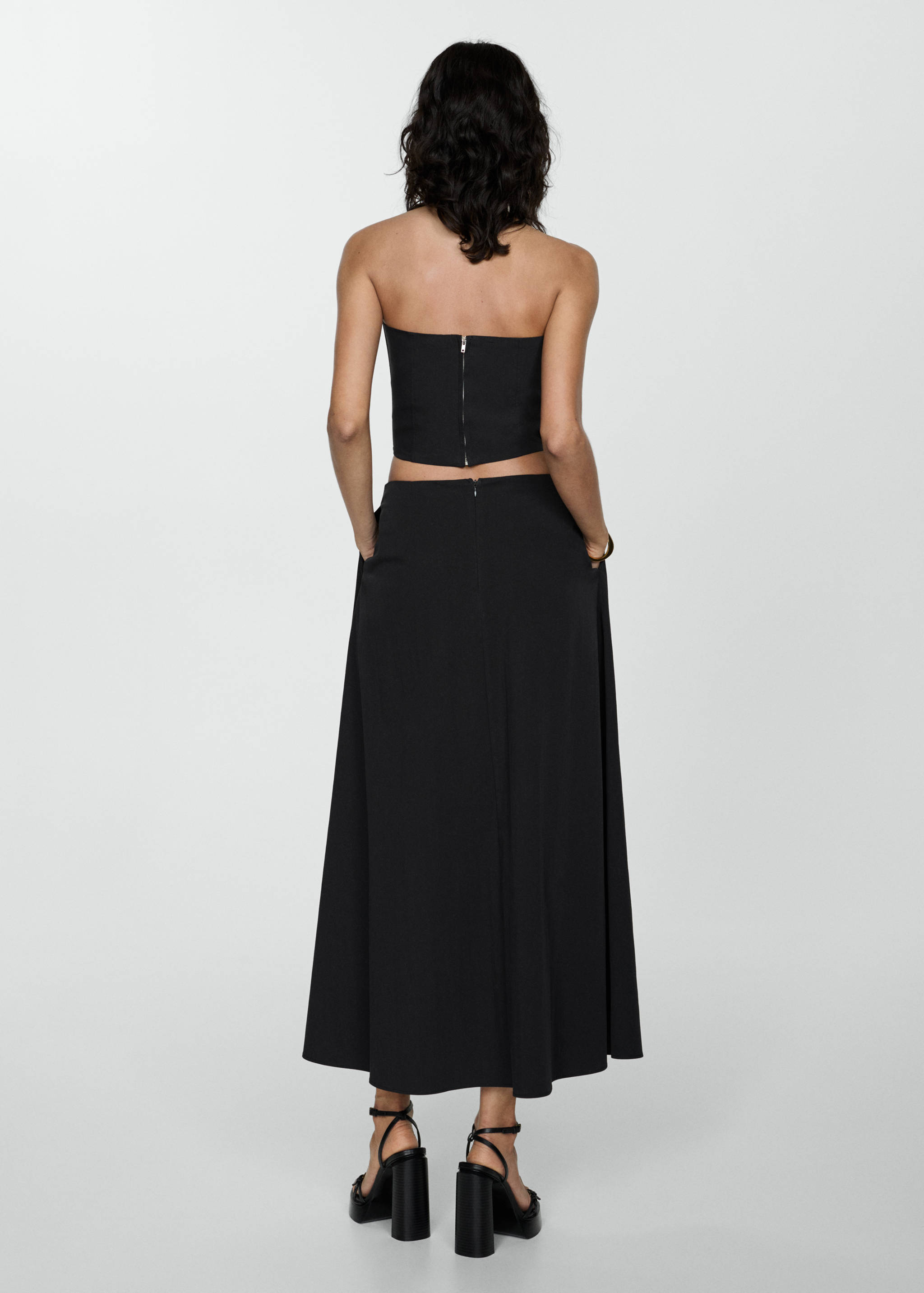 Long flared skirt - Reverse of the article