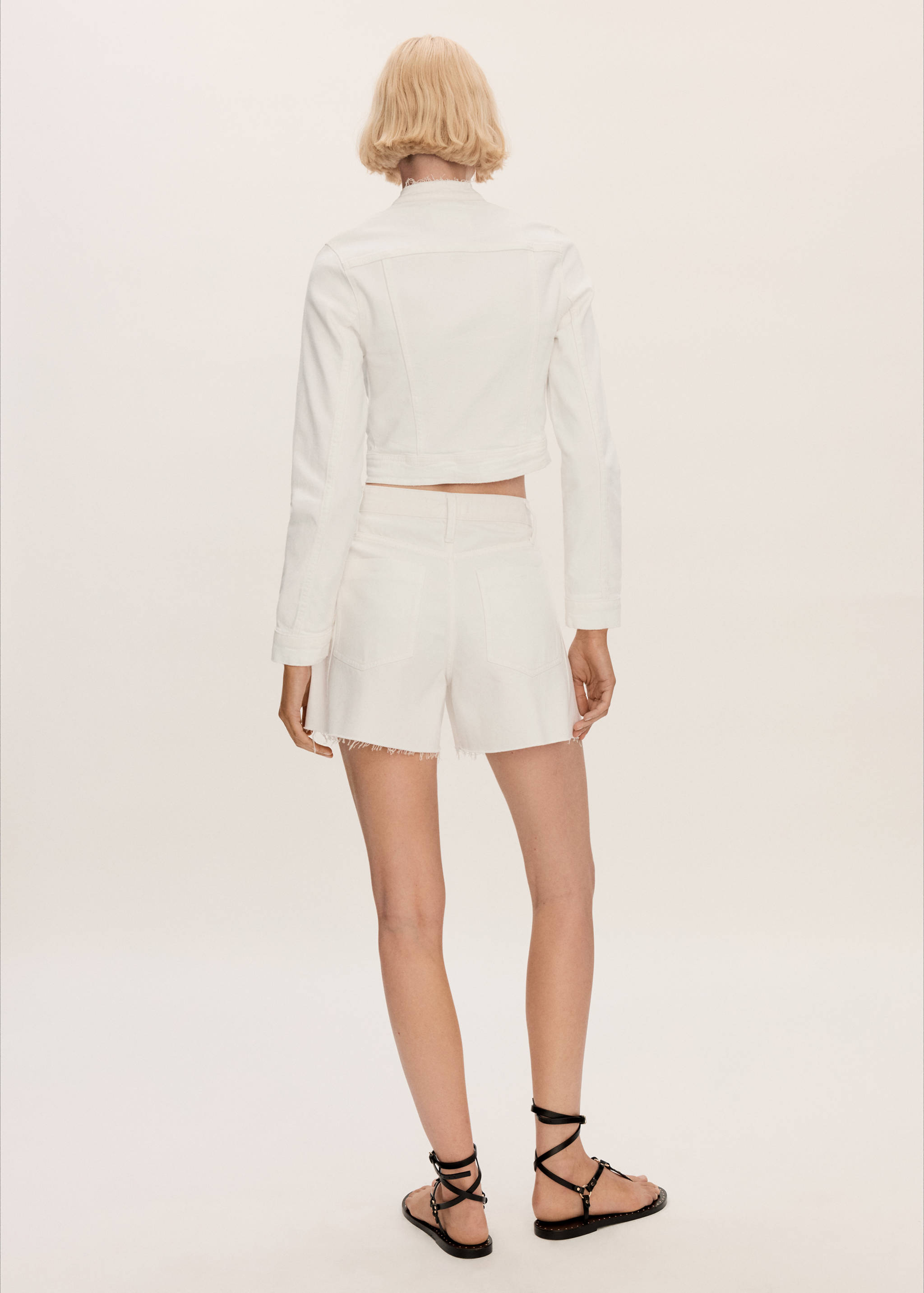 Denim shorts with frayed hem - Reverse of the article