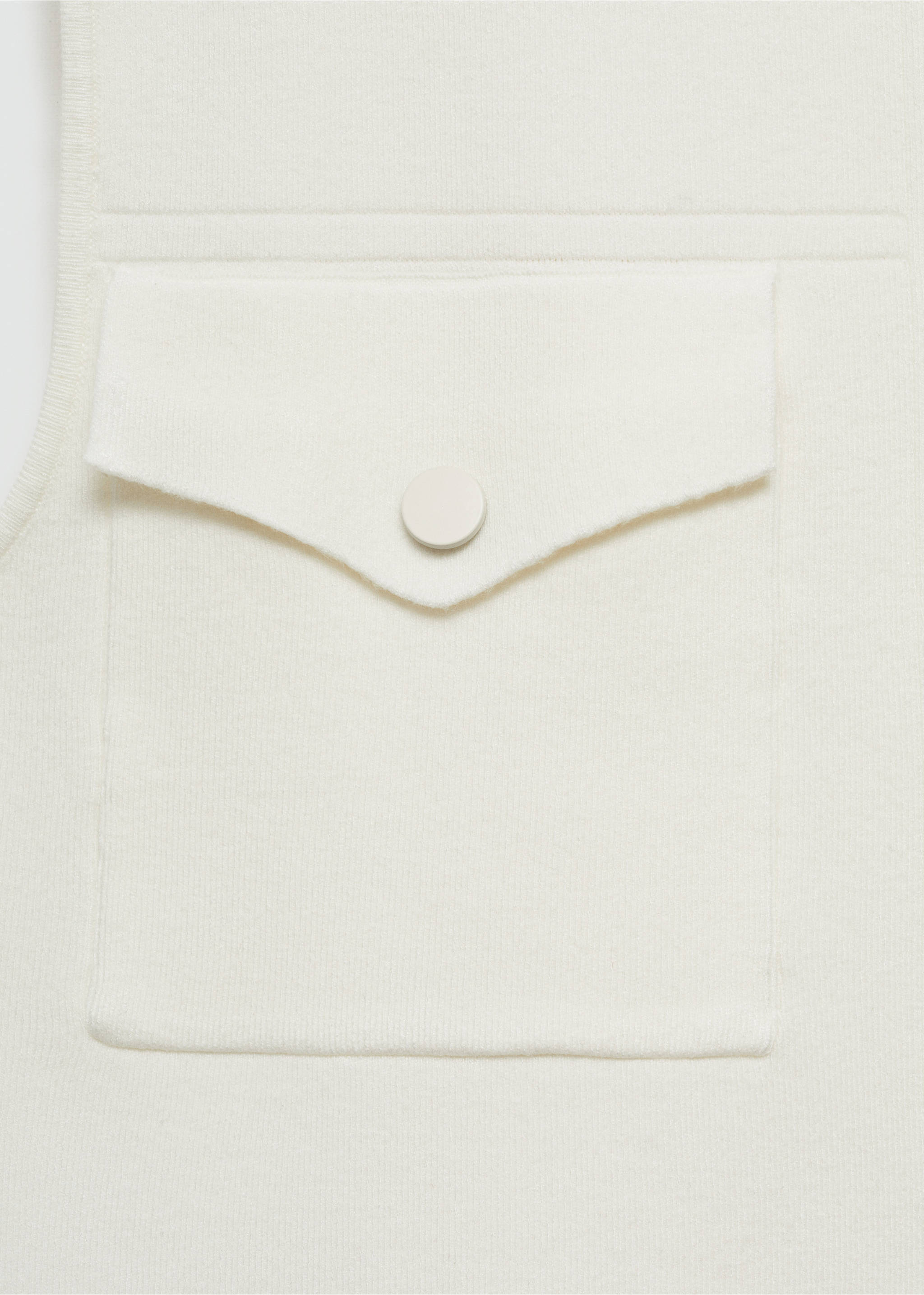 Knitted waistcoat with pockets - Details of the article 8, Ecru. Ref: 77054022-00.