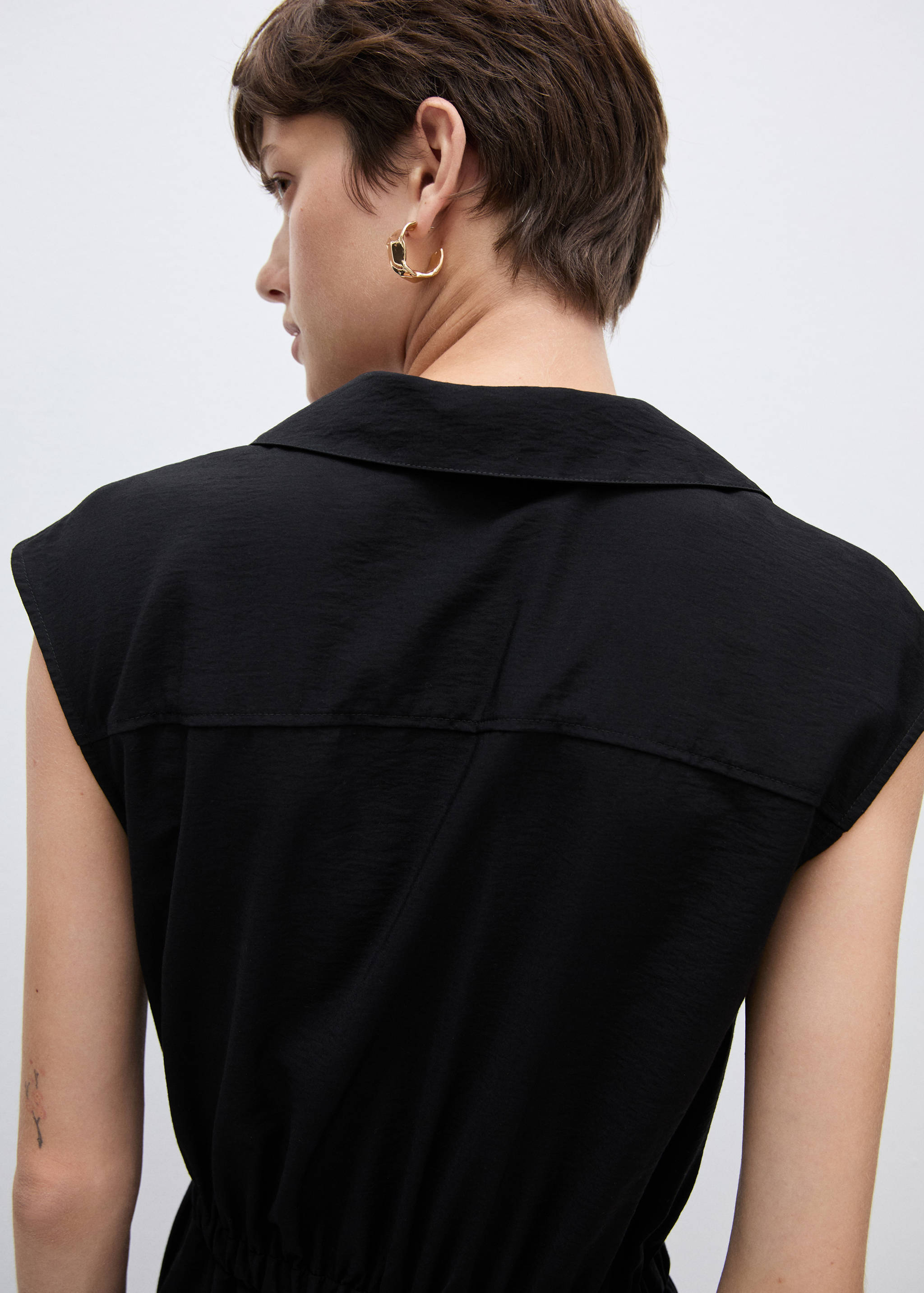 Jumpsuit with pockets and shirt collar - Reverse of the article