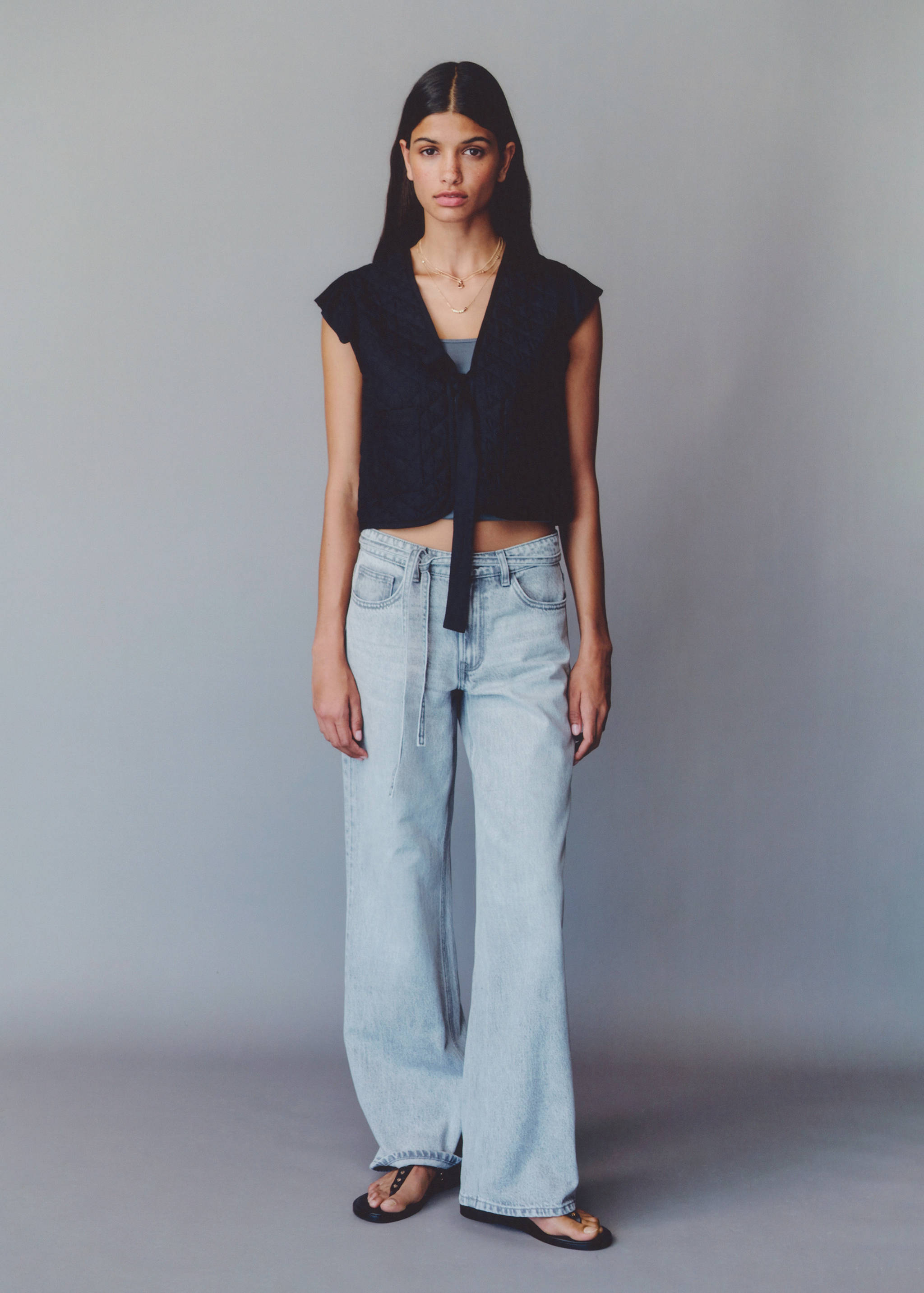 Quilted vest with pleat - Details of the article 7