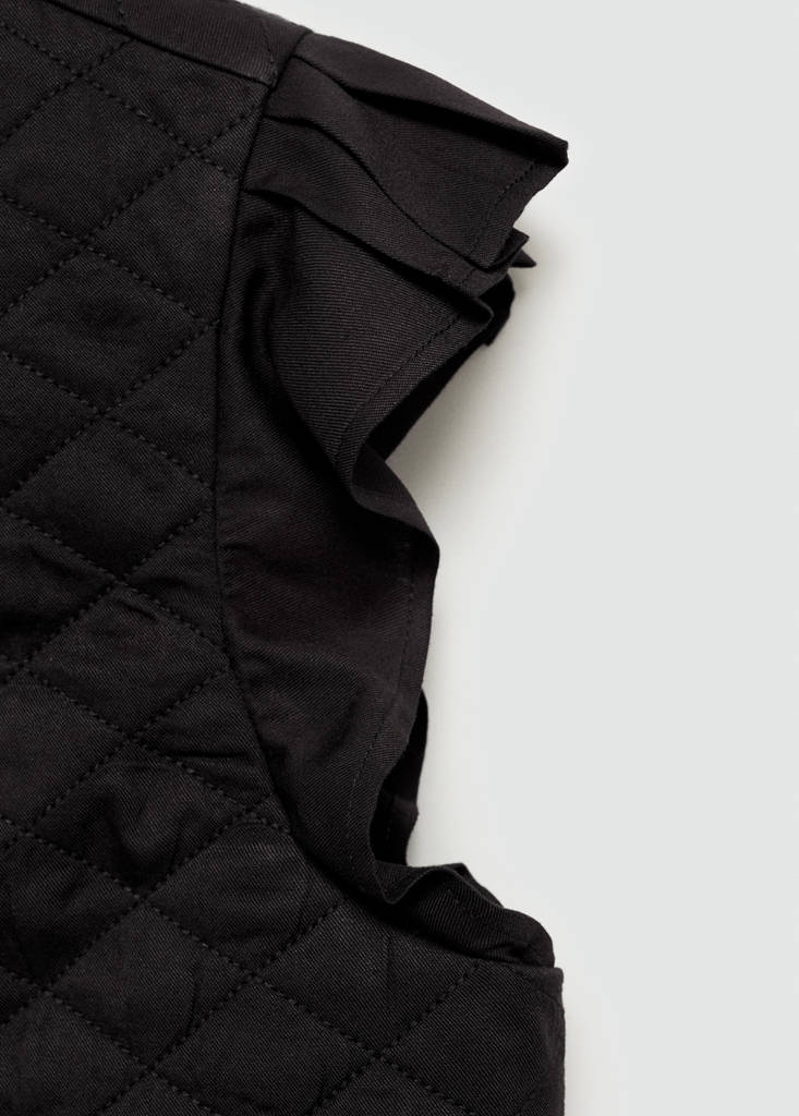 Quilted gilet with pleat — Black