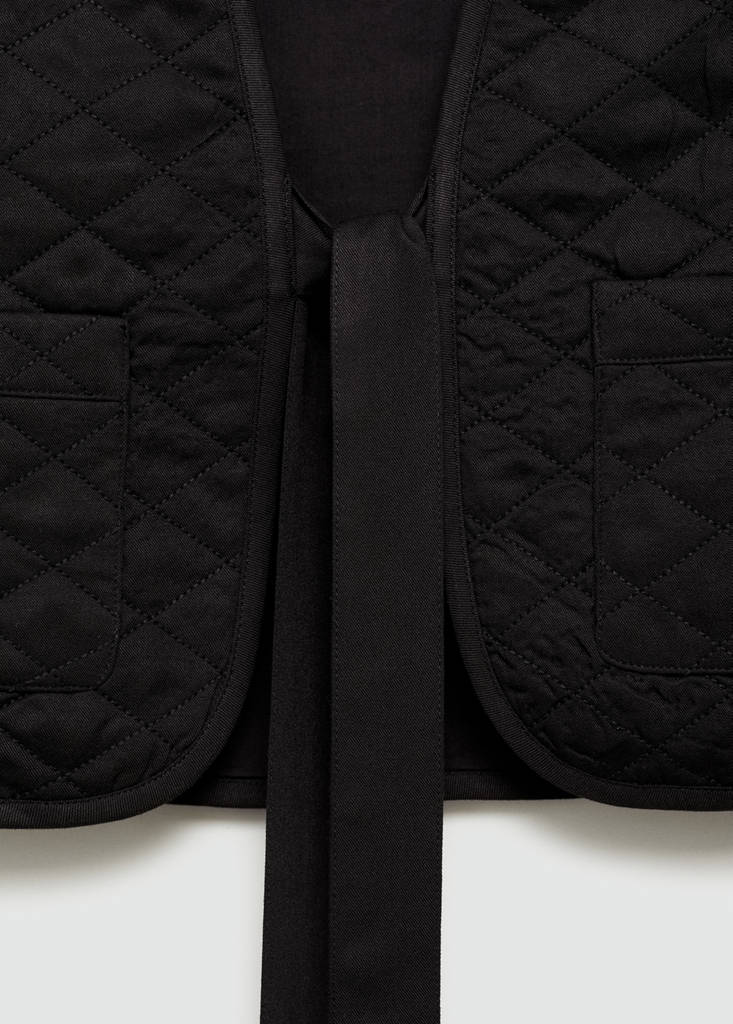Quilted gilet with pleat — Black