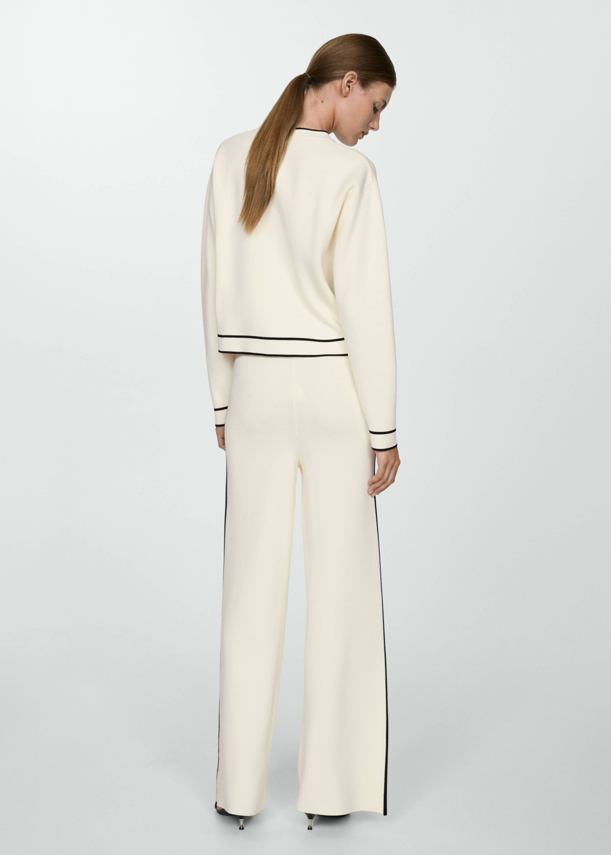 Striped knitted trousers with contrasting sides - Reverse of the article