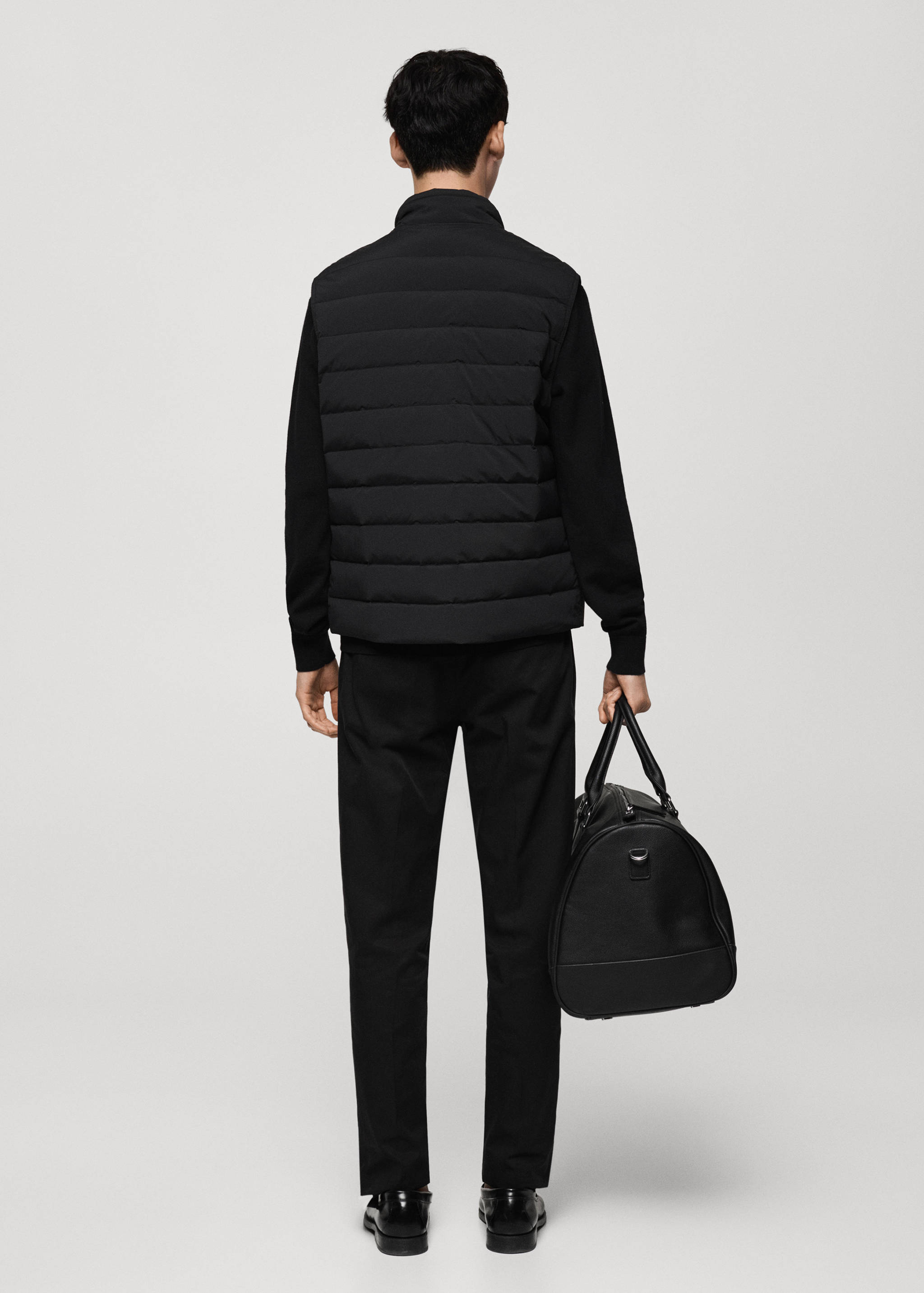 Quilted gilet with feather filling - Reverse of the article