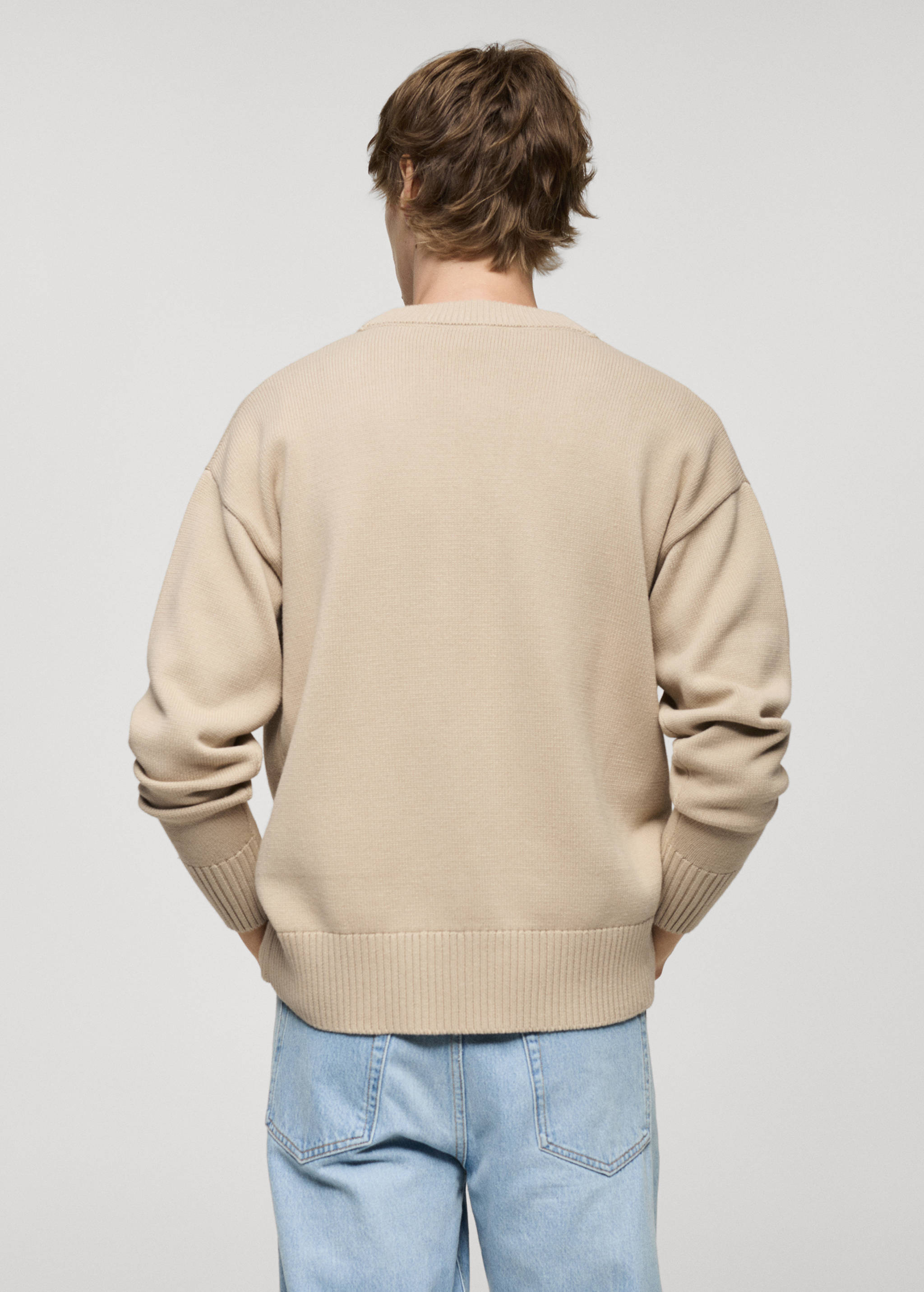 Knitted cotton cardigan with buttons - Reverse of the article