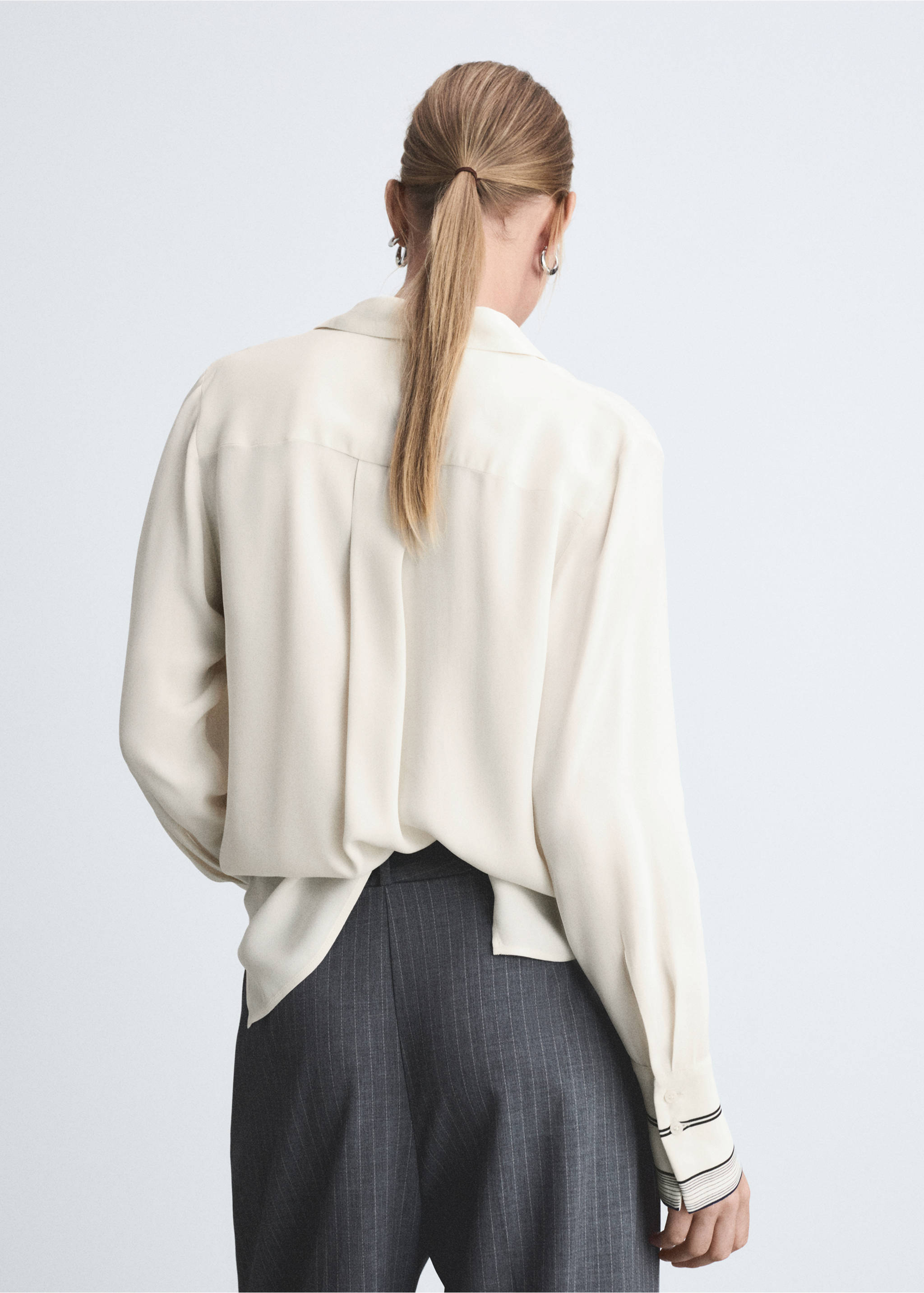 Back view of a cream long-sleeved shirt with a collar and back pleat., Off White. Ref: 77055643-00.