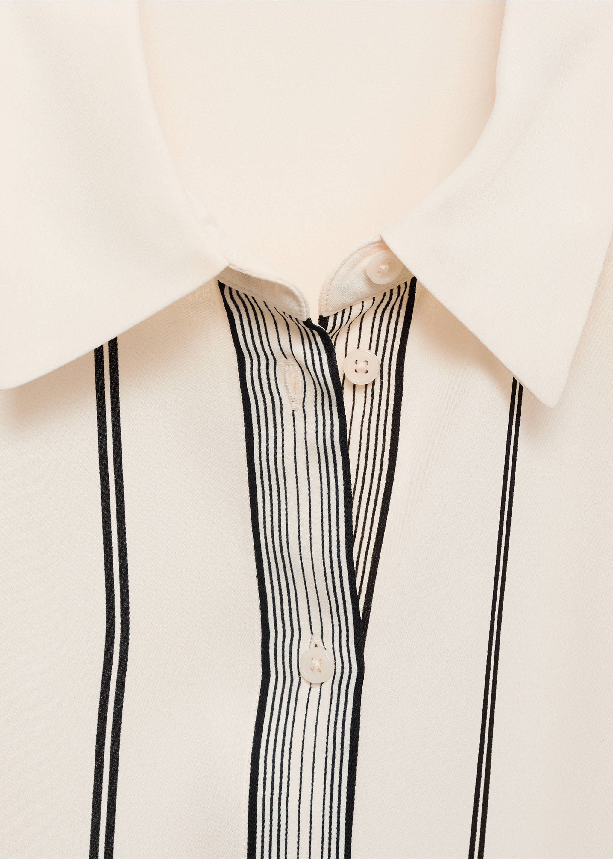 Close-up of a cream shirt collar and button placket with black stripes., Off White. Ref: 77055643-00.