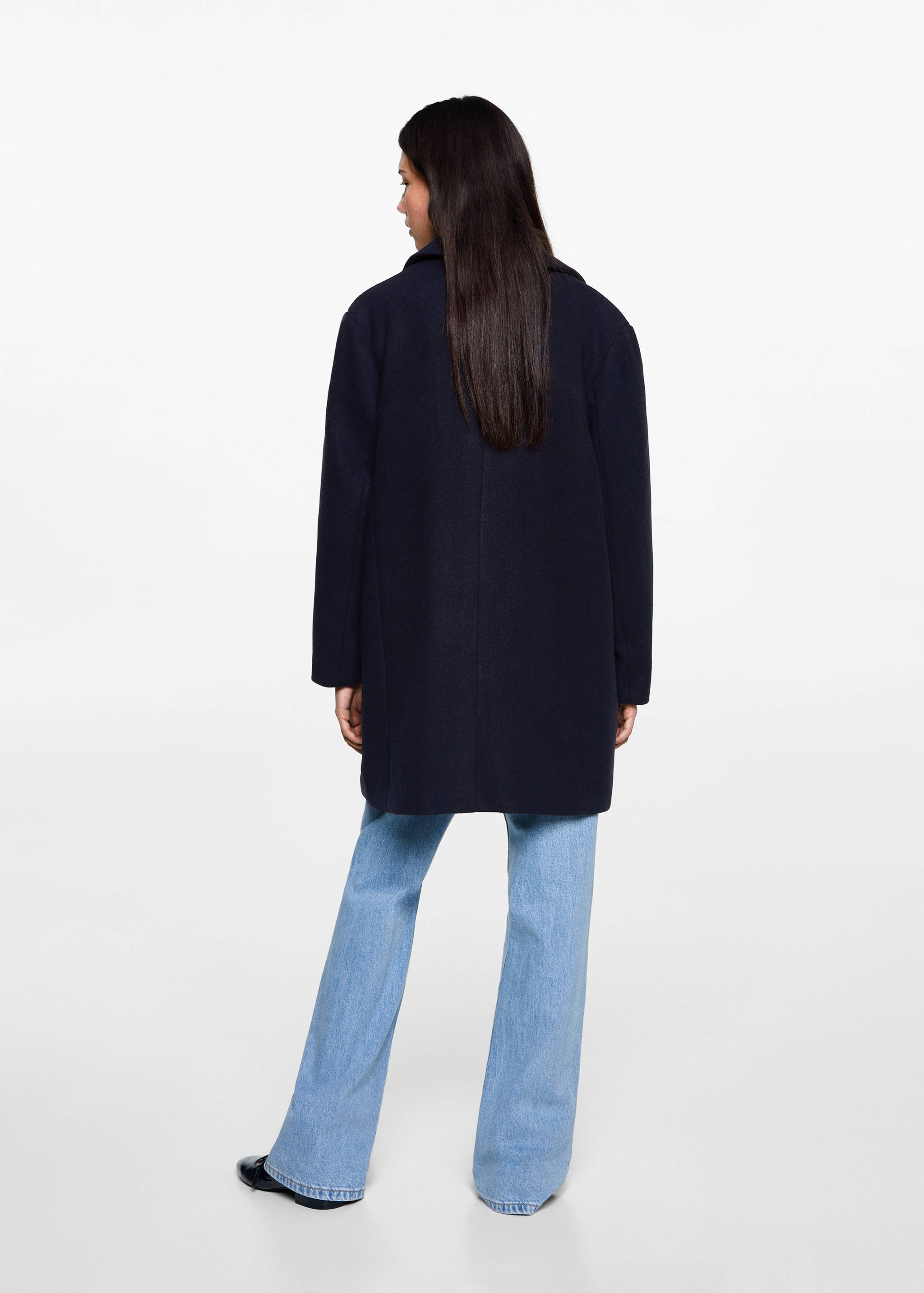 Cloth coat with pockets - Reverse of the article