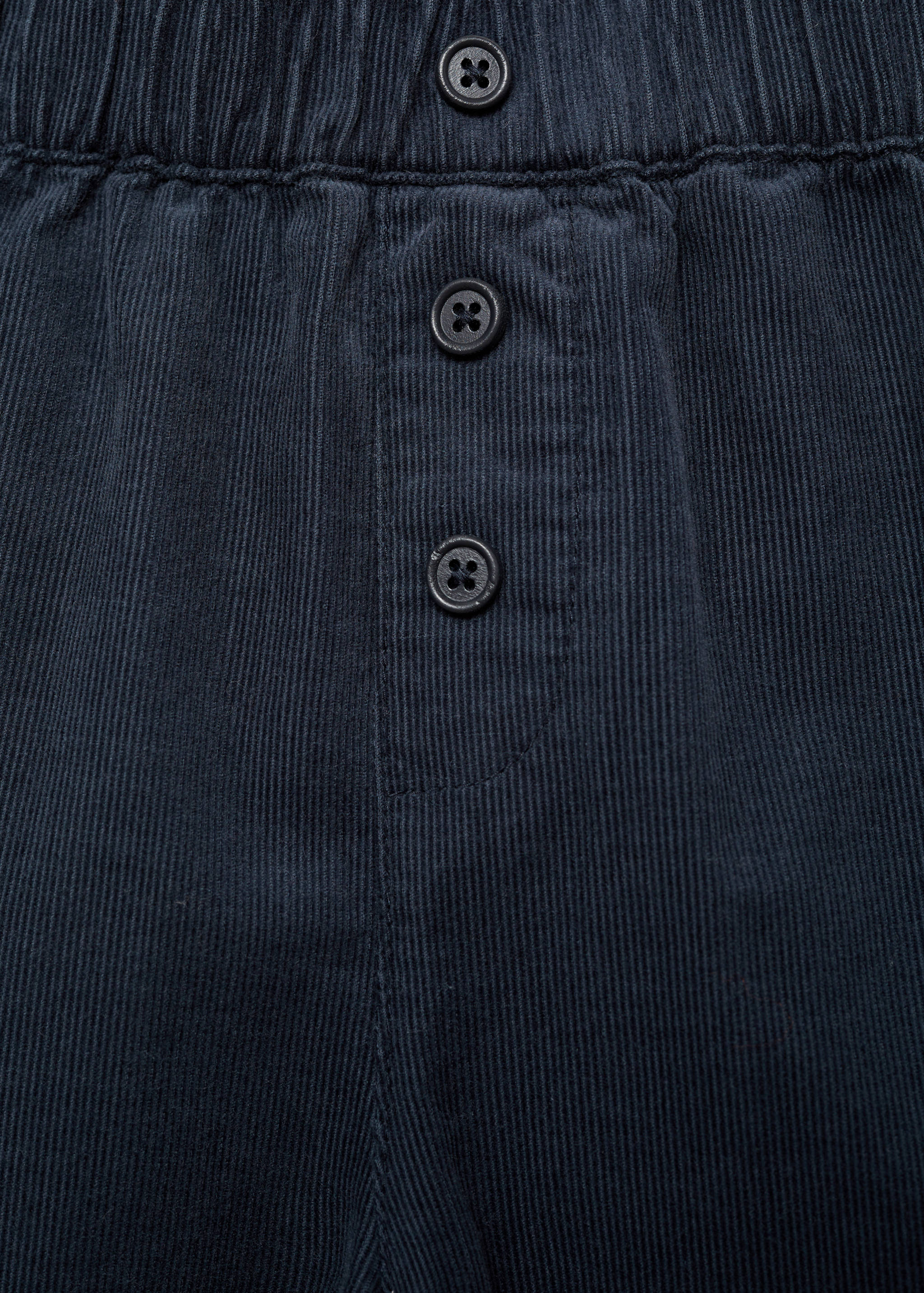 Buttoned corduroy trousers - Details of the article 8
