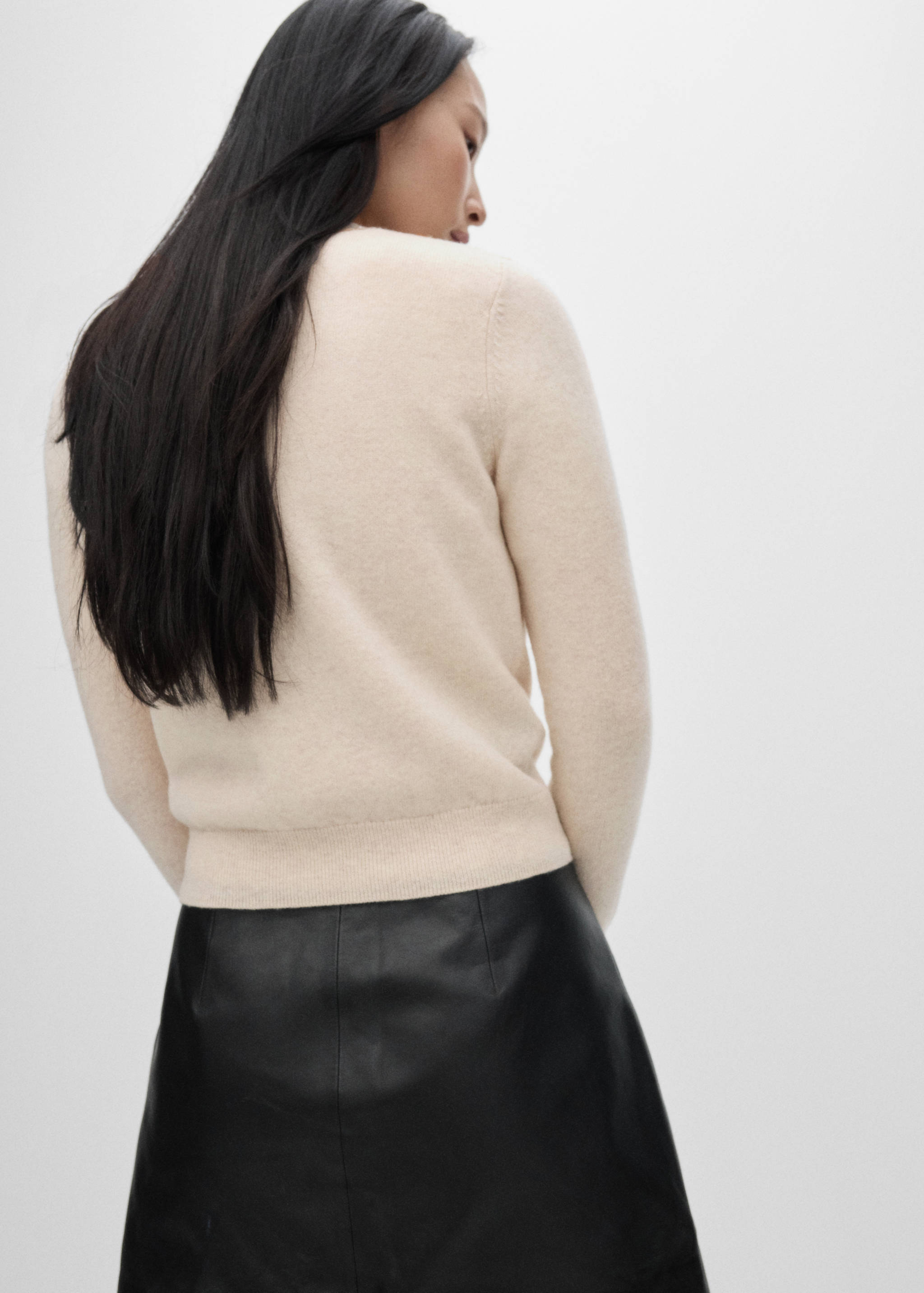 Wool cardigan with decorative stitching - Reverse of the article