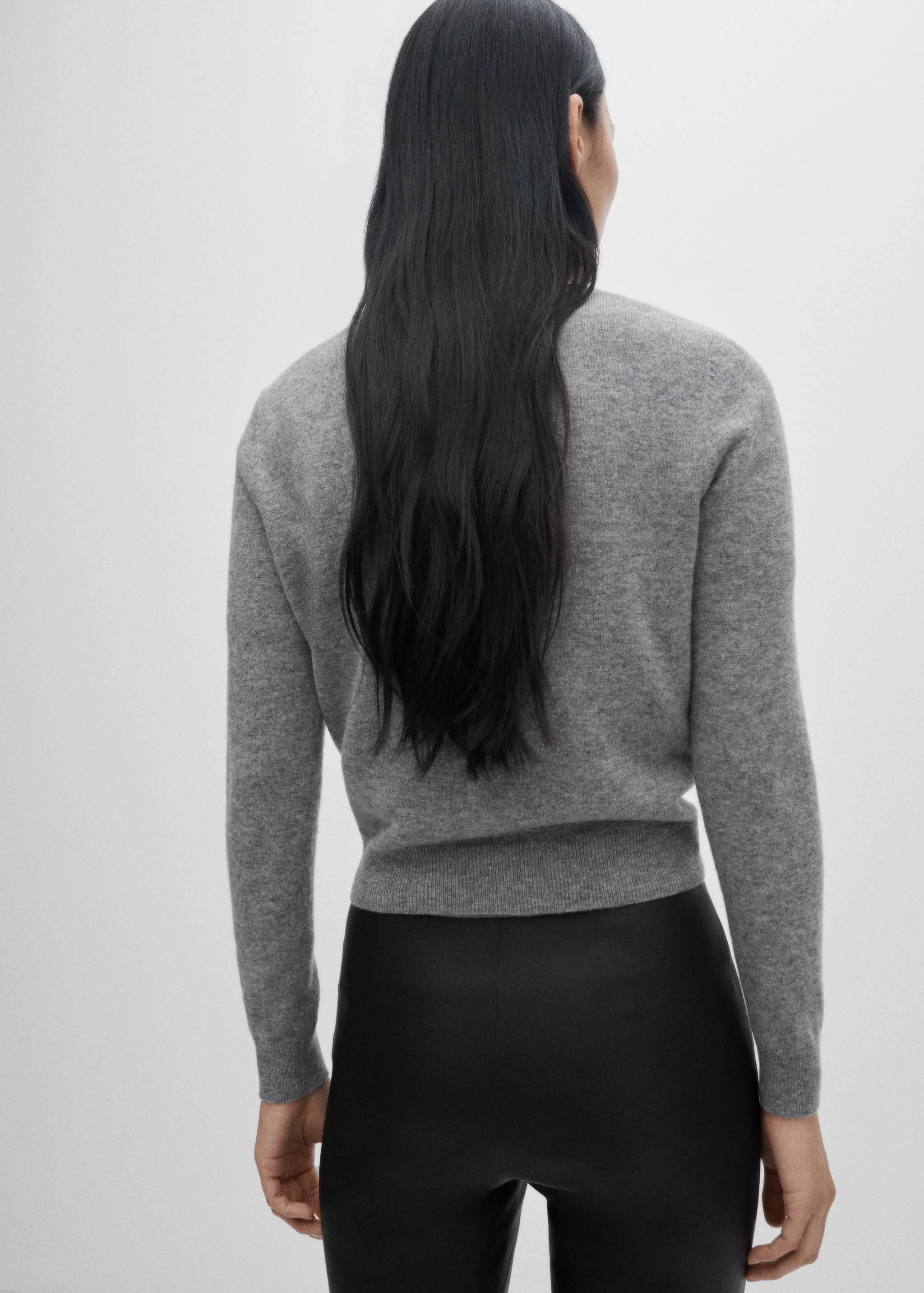 Wool cardigan with decorative stitching - Reverse of the article